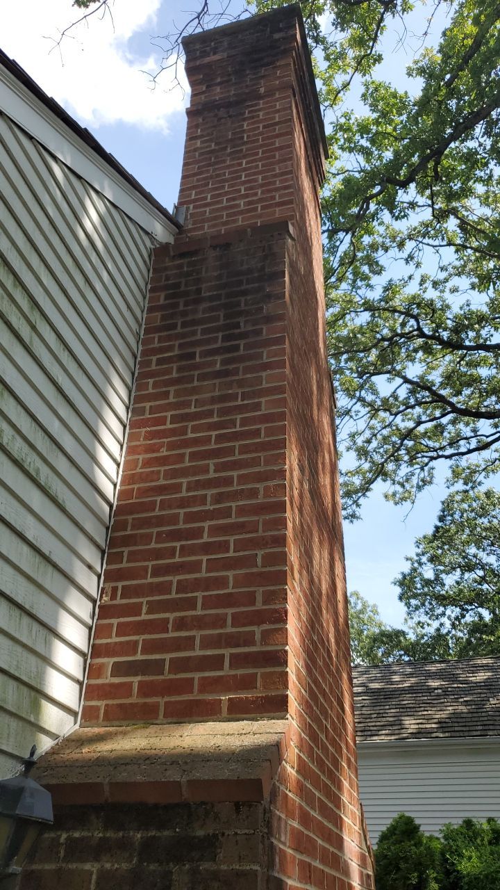 Housewashing  using Algaecide, soft wash soap by Northern Power Washing LLC.
