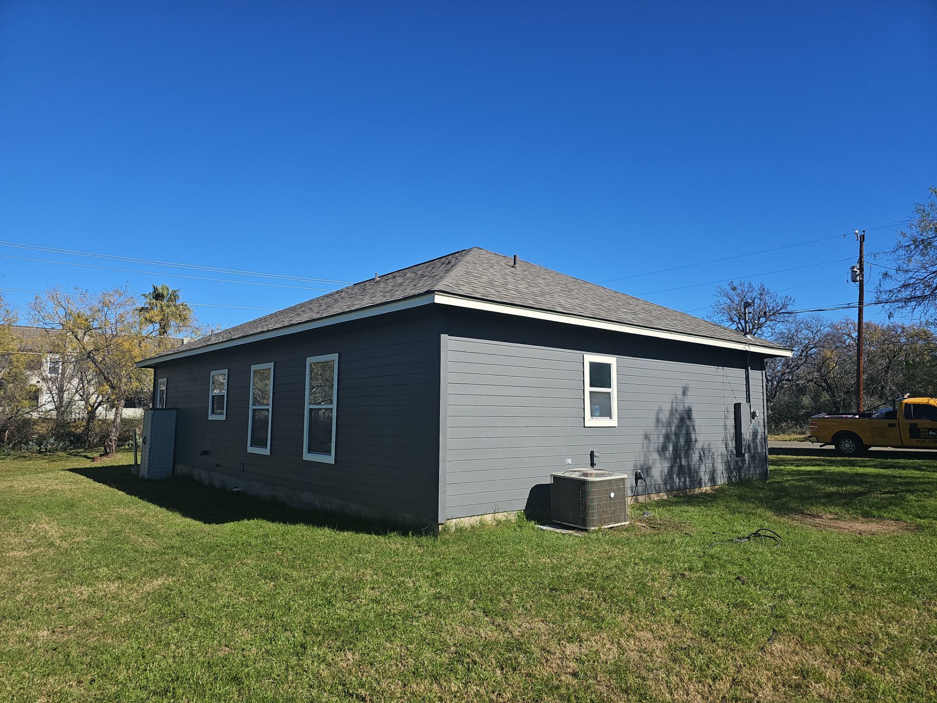 Residential Roofing Installation using Owens Corning Duration TruDef Driftwood by DeZign Roofing & Exteriors
