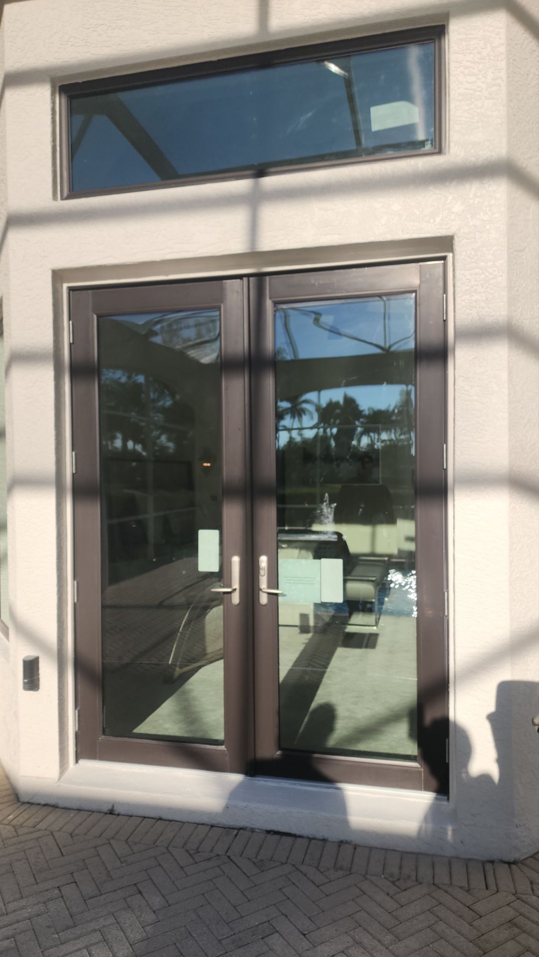 Window Installation using PGT Vinyl White-Bronze by Windows For Life 