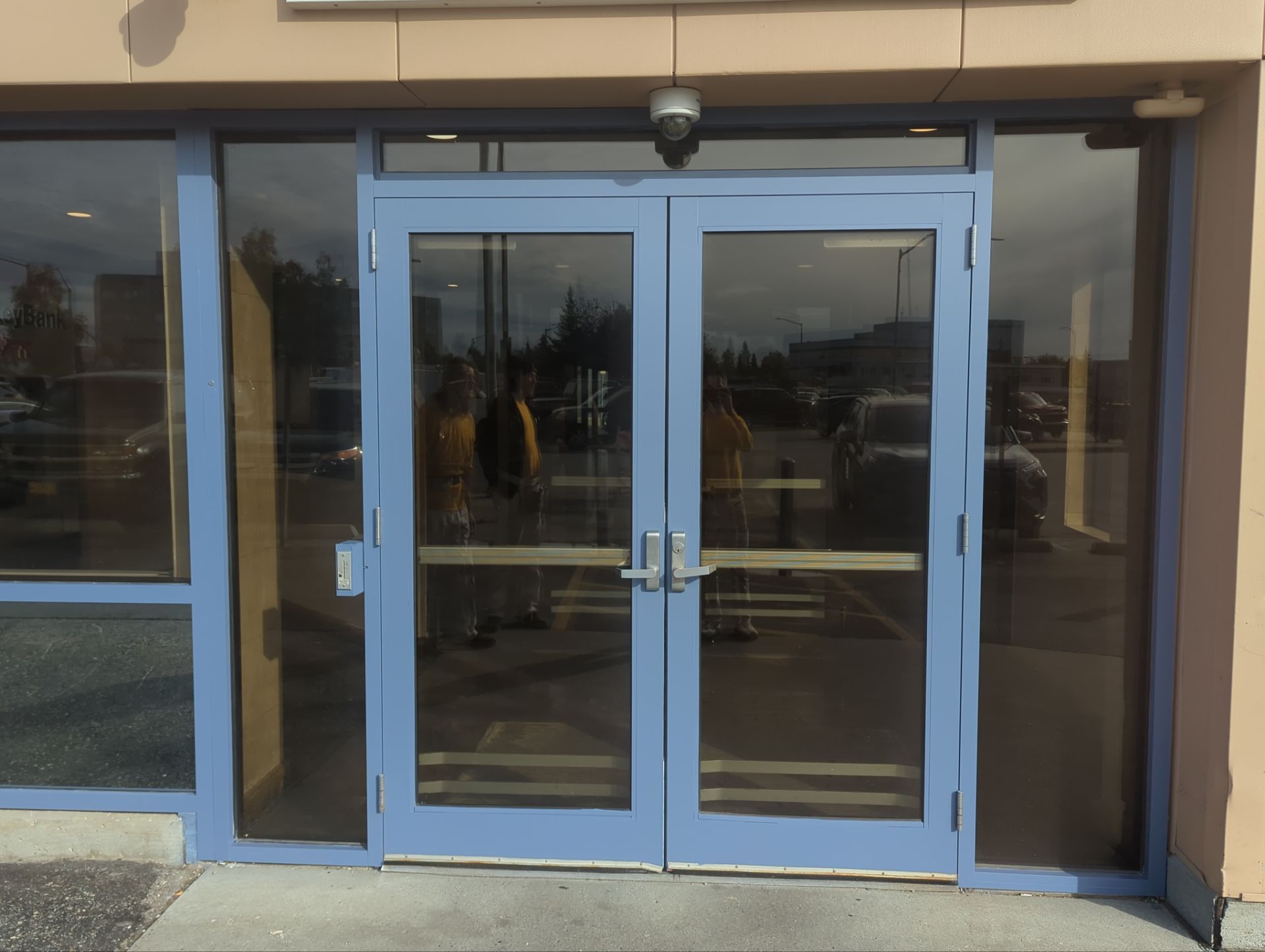 Commercial Exterior Door & Window Repaint by Midnight Sun Painting