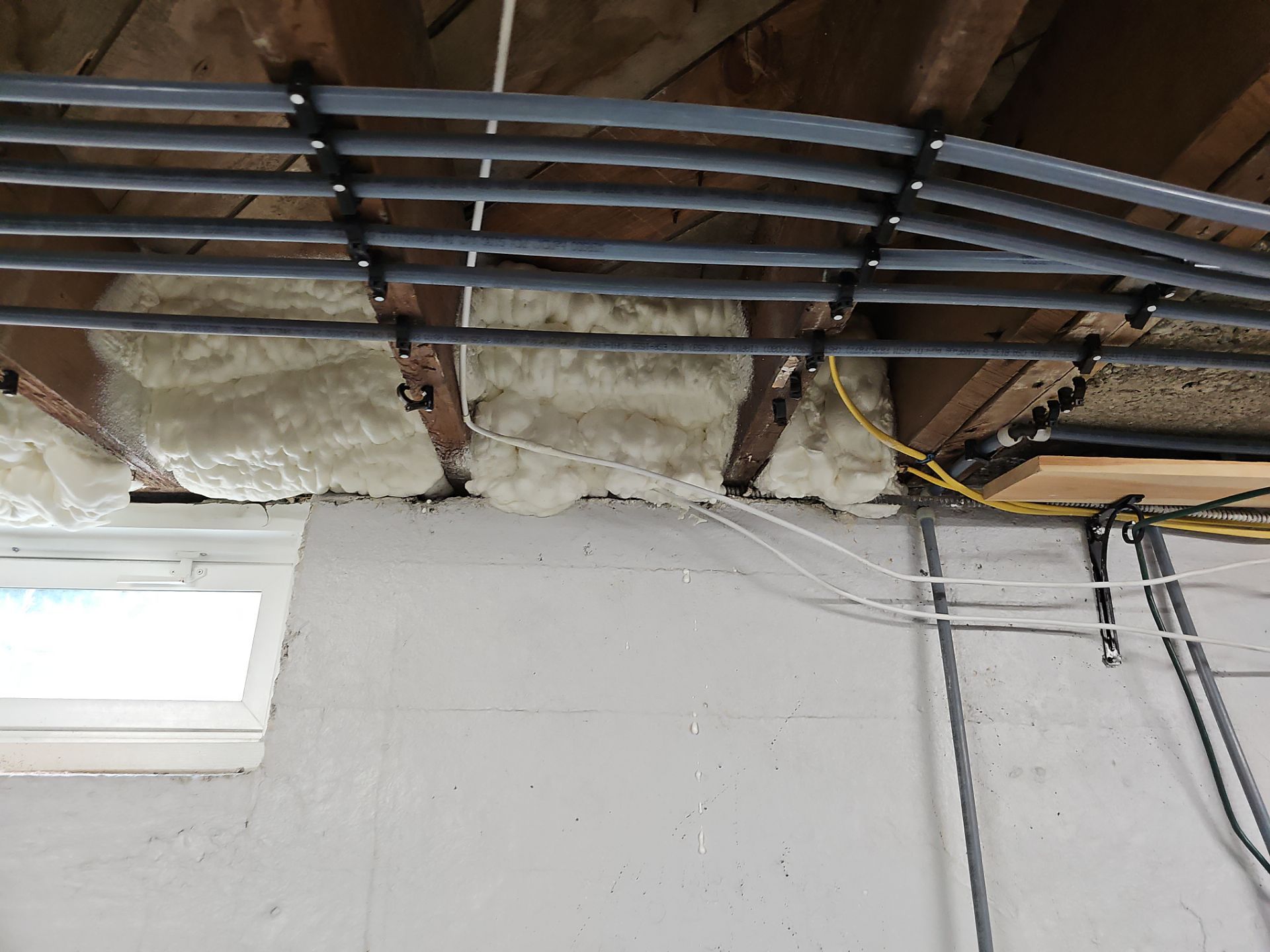 Attic Insulation using open cell spray foam by NYS Foam & Energy