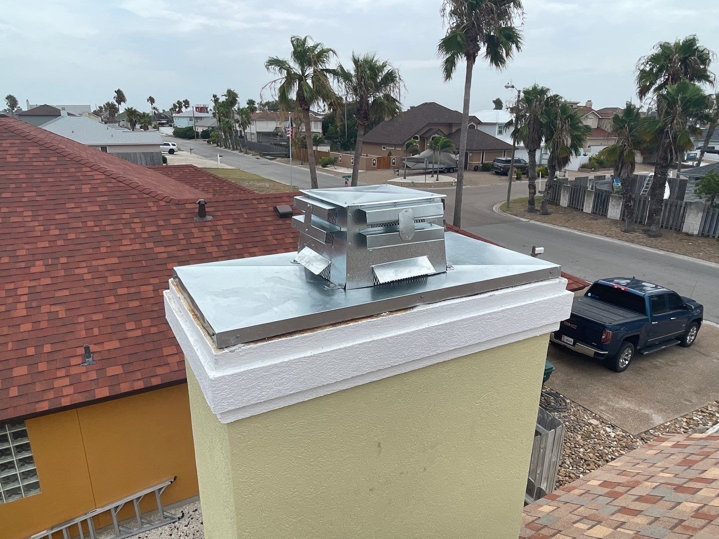 Residential Roofing Repair - Replacing Chimney Cap by Lighthouse Roofing