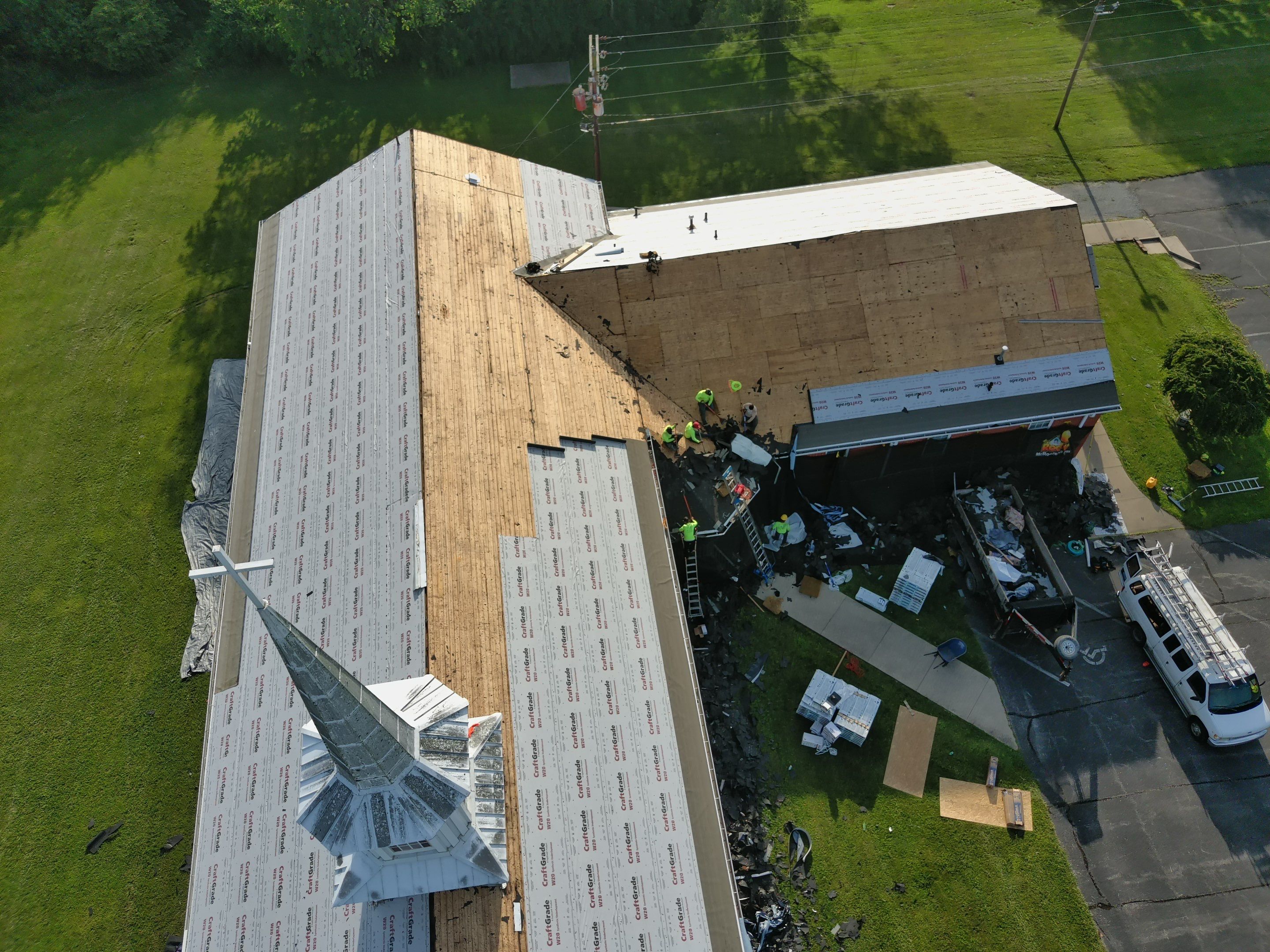 Commercial Roofing Installation using Performance Shingles by Mr. Roofer