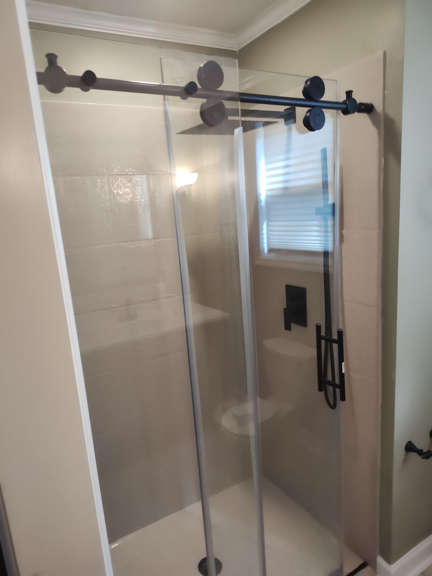 Bathroom Remodel using Onyx by Cornerstone Home Builders, LLC