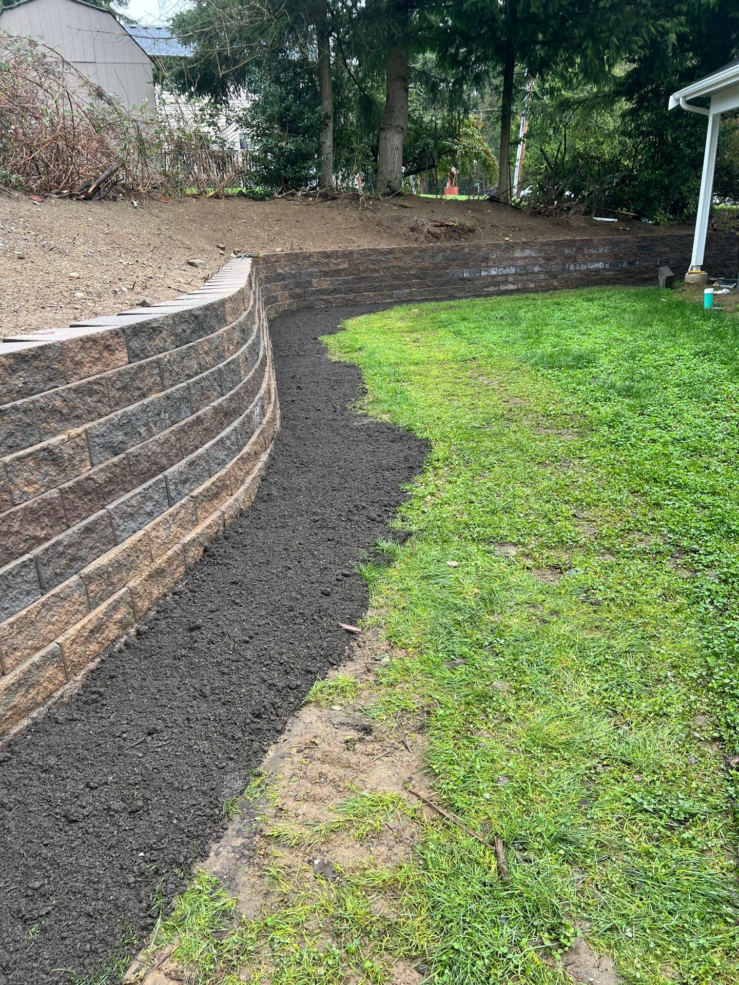 Retaining Wall and Backyard Renovation | Everett  by Jireh Asphalt & Concrete Inc 