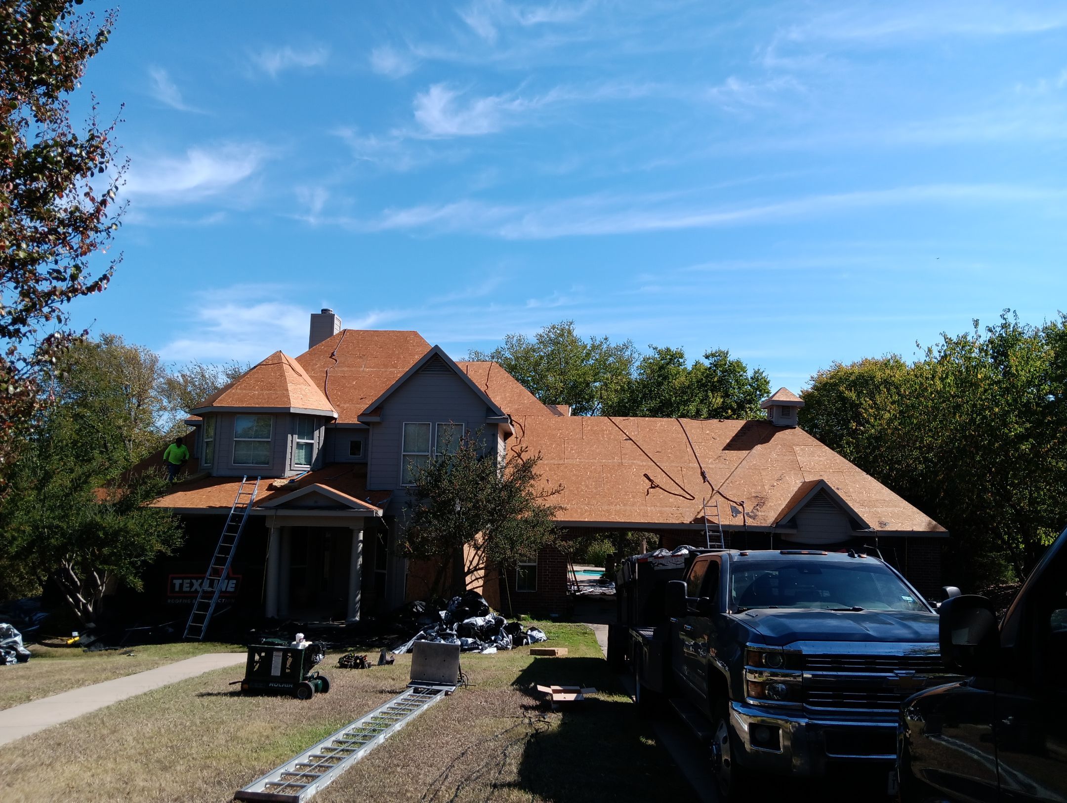 Insurance Claim Roof Paint and Gutters by Tex-Line Roofing