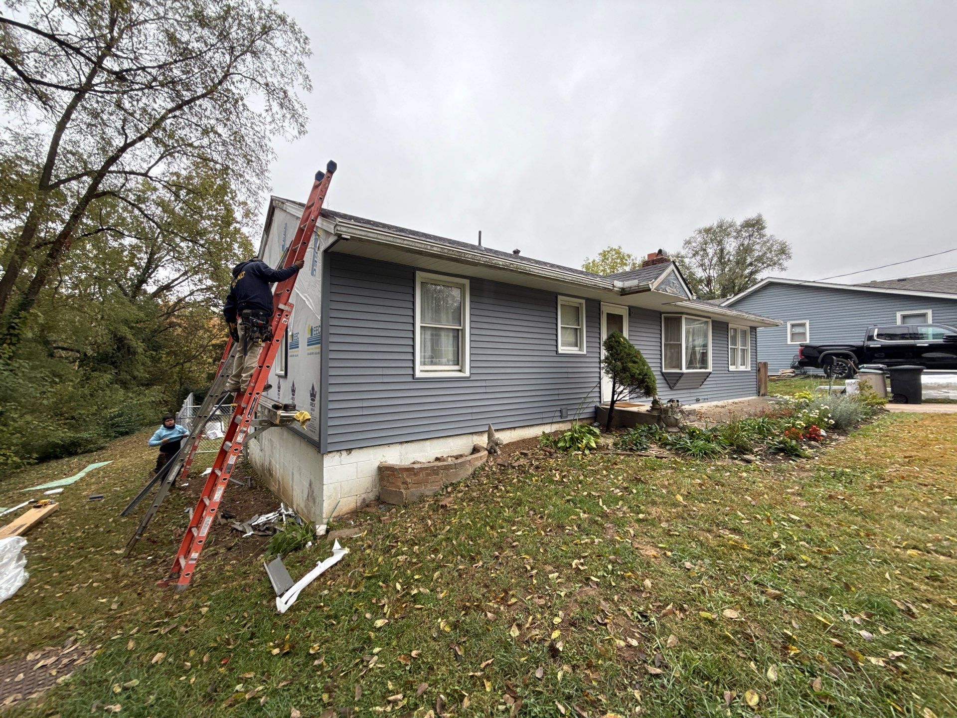 Feeling Blue in Weston Mo - Time for a Makeover by EEC Windows, Siding & Roofing
