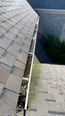 Why Millington Gutters Clog and Ice Up