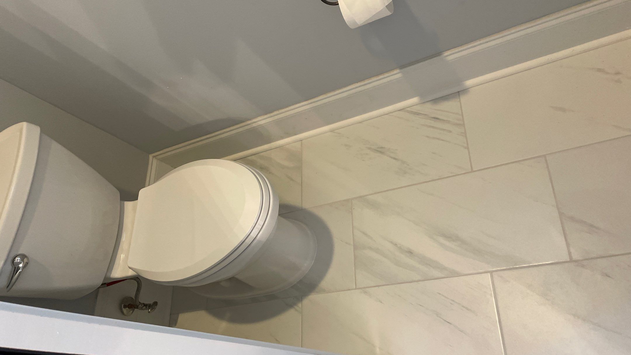 Bright Bathroom Remodel with Wall Removal, Stand Alone Tub and New Vanity by Footprints Floors of Coastal Carolina