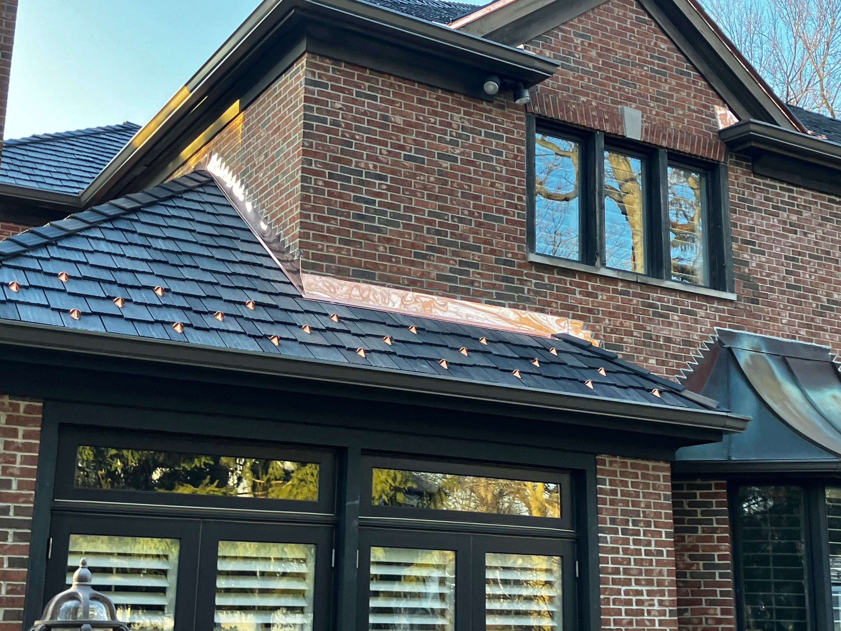 DaVinci Slate Installation with Copper Valleys by Custom Installations