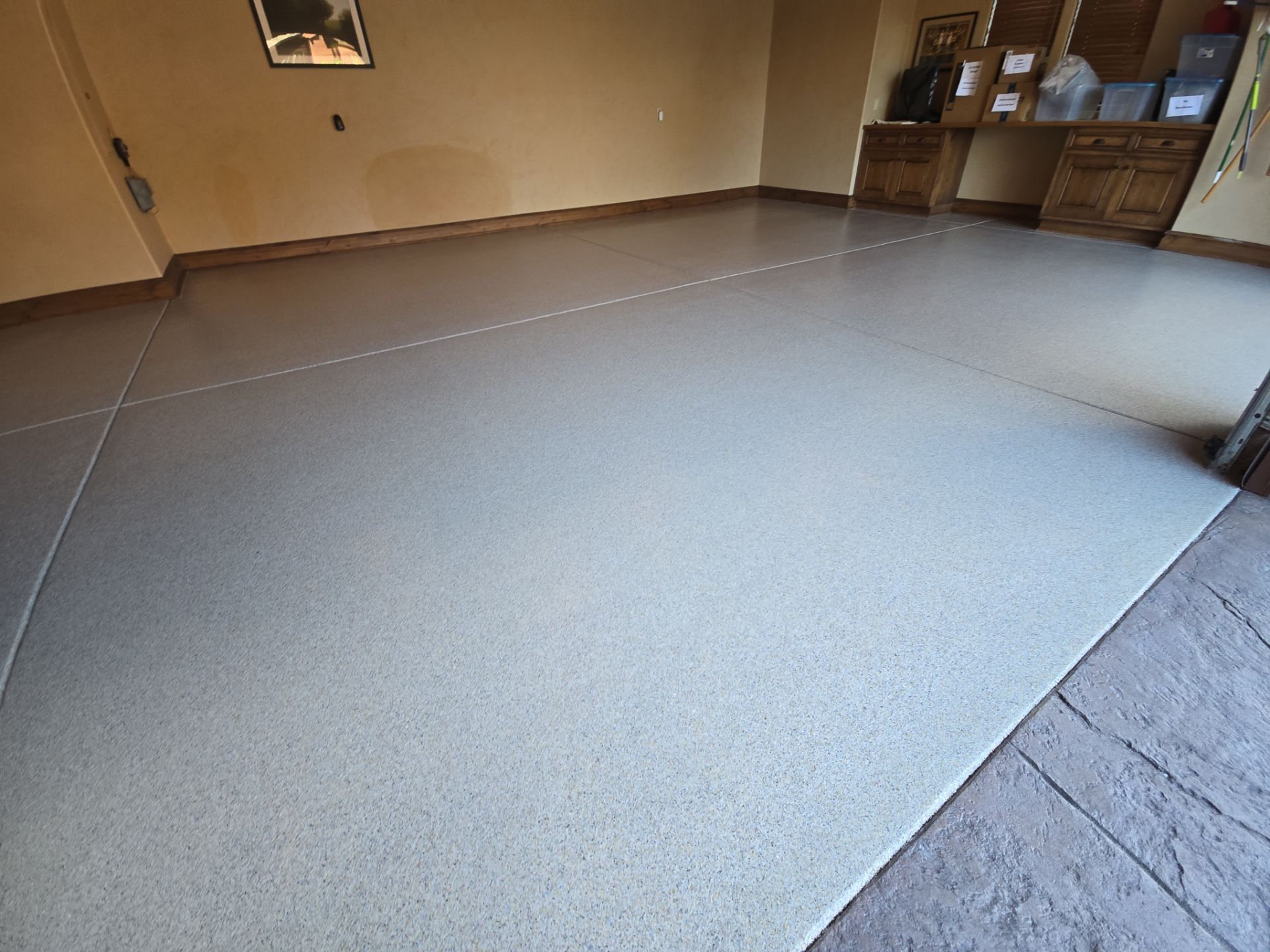 Garage Transformation using Stone/Marble Hybrid by Croc Coatings, LLC