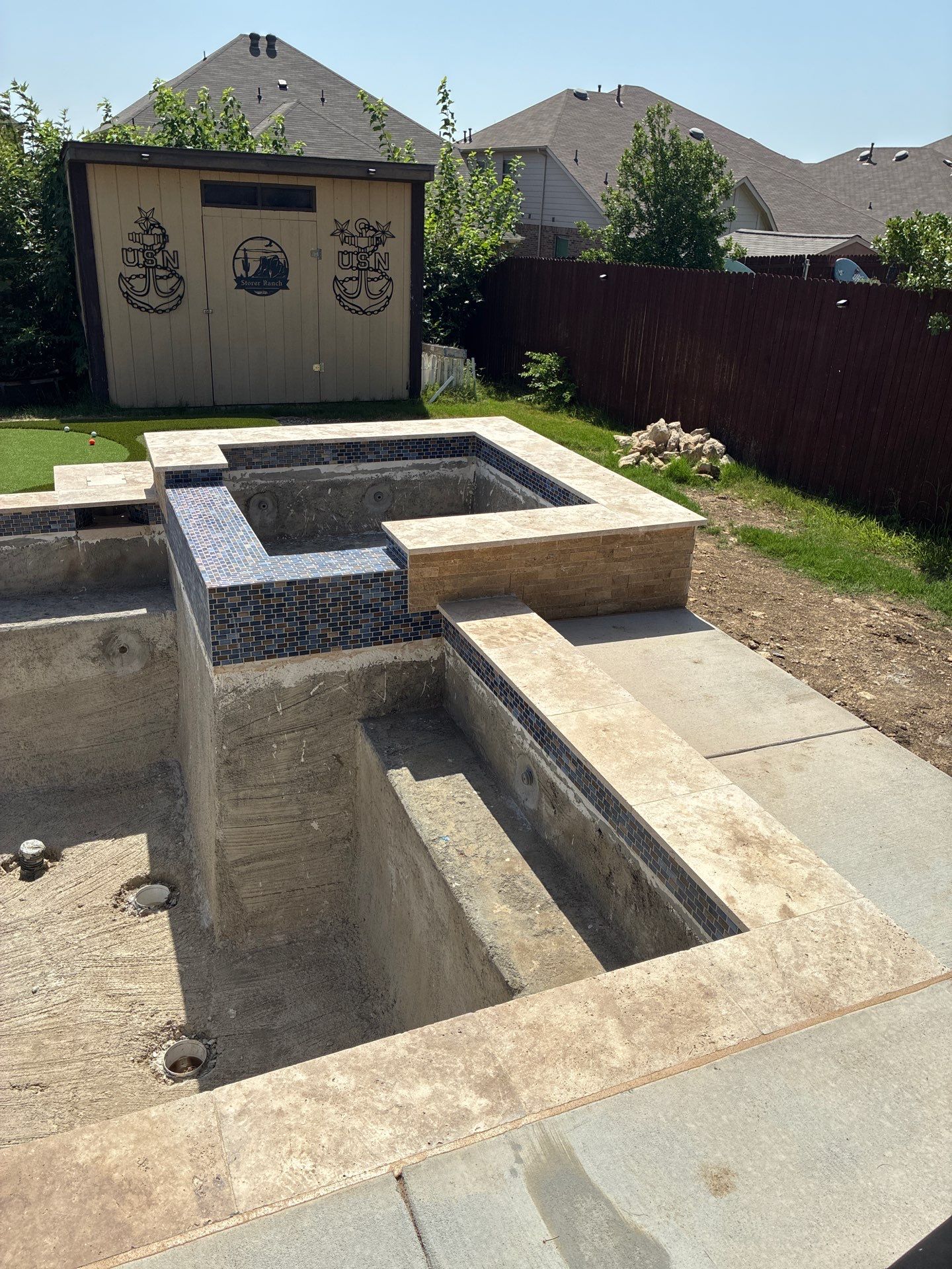 Geometric Pool with Raised Spa and Spillway by Pinnacle Pools and Spas - DFW