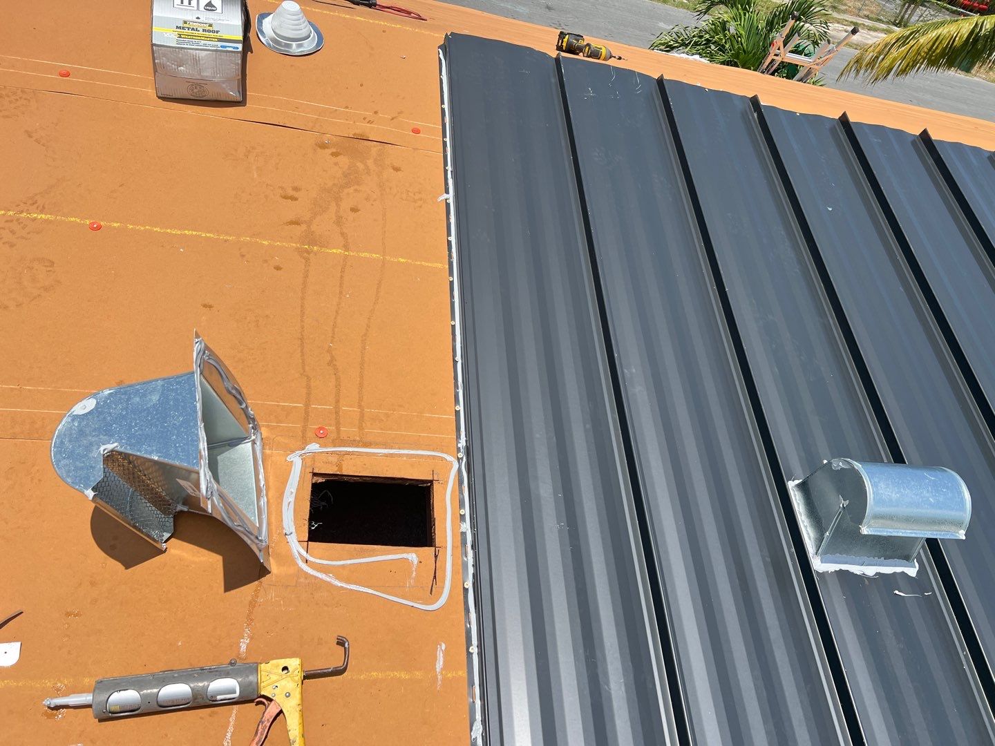 Standing Seam Metal & Flat Re-Roof using 1.5" Nail Strip 24ga Black Matte Kynar Coated Standing Seam Metal Panels by Morton Roofing, Inc.