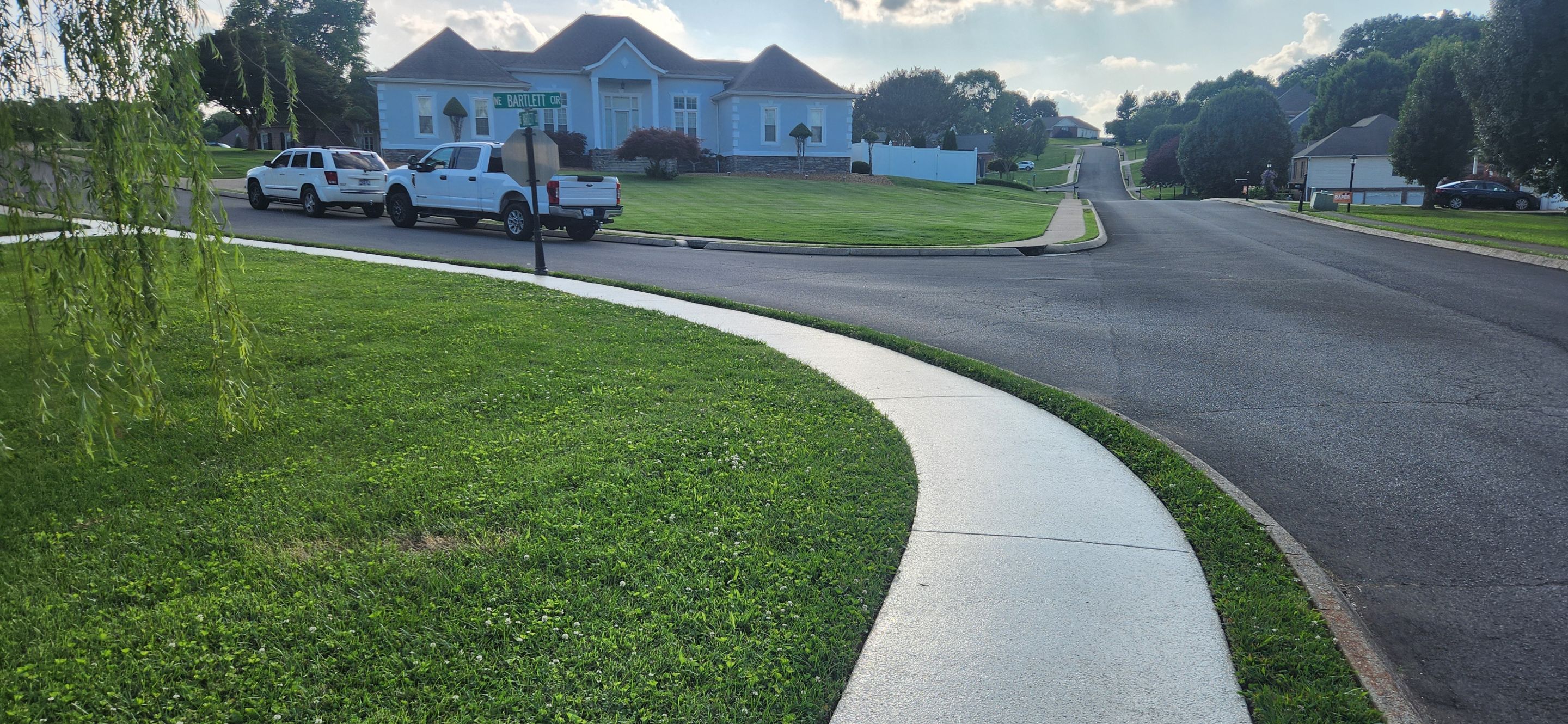 Incredible transformation on Driveway Garage and Sidewalk! by Elite Floor Solutions