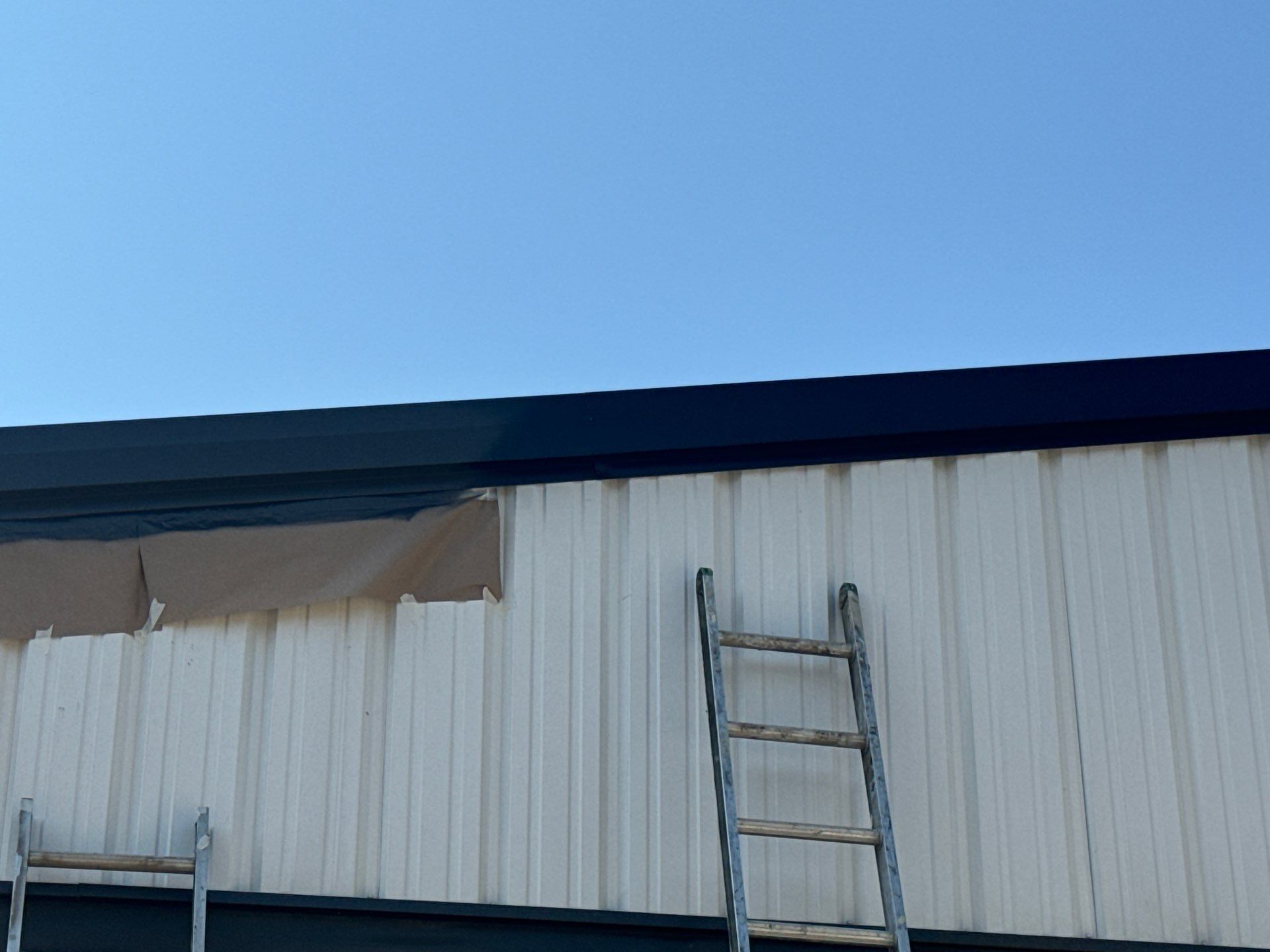 R-Panel Replacement by First Out Roofing 