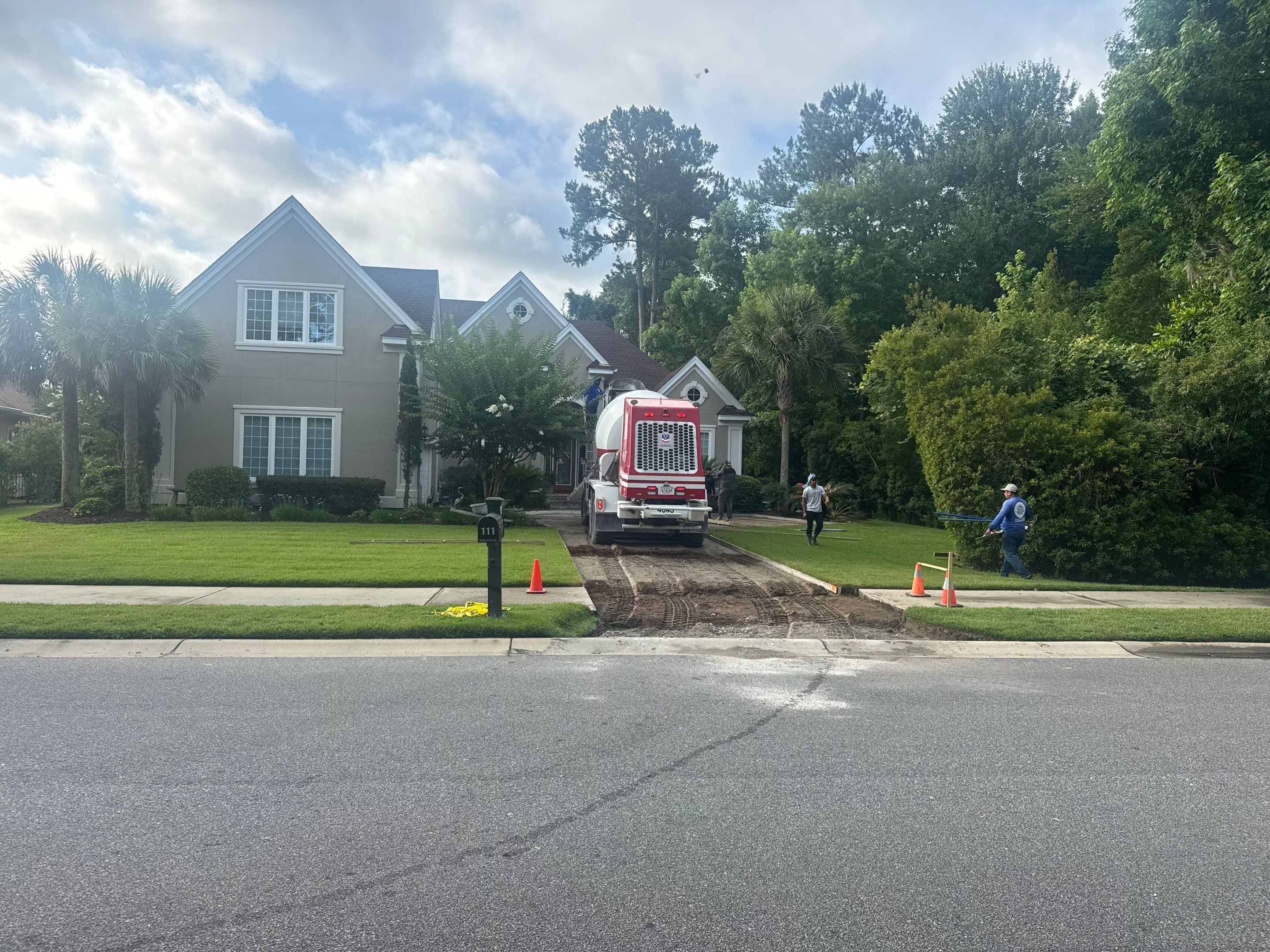 Custom Concrete Driveway and Decorative Paver Installation in Bluffton by Lowcountry Scapes, LLC