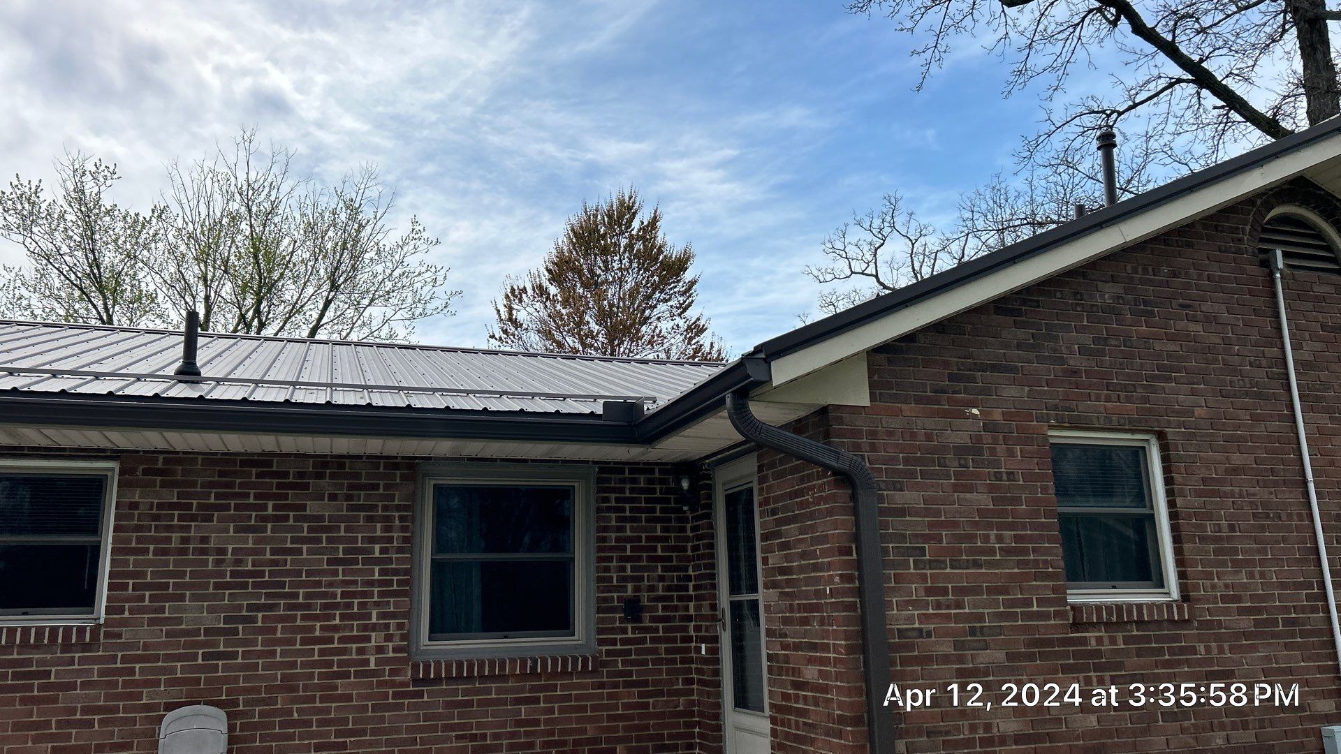 Residential Roofing Installation using Performance Panel Metal - Crinkle Bronze by RoofX 