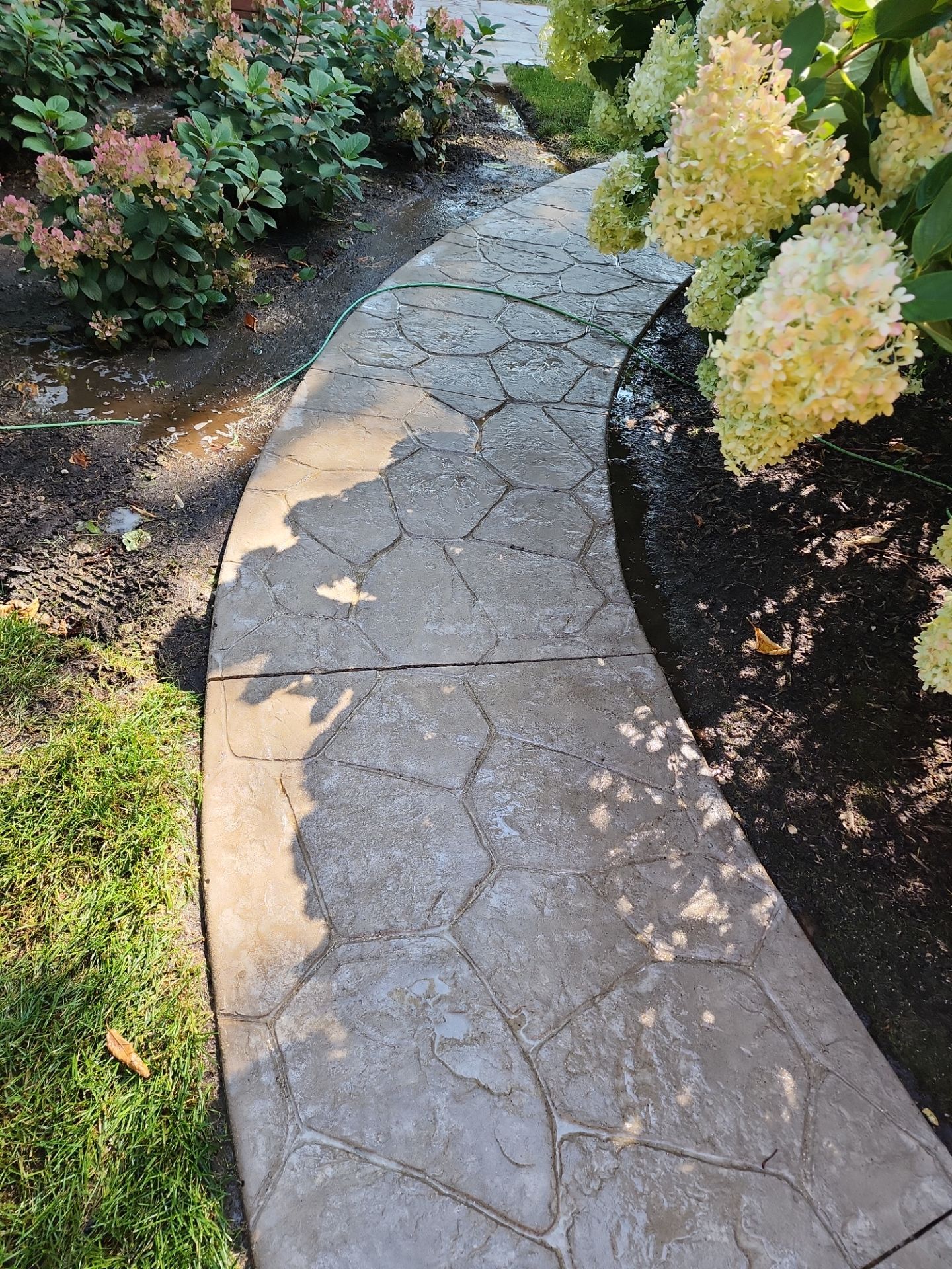 Stamped Concrete Surface Cleaning by Northern Power Washing LLC.