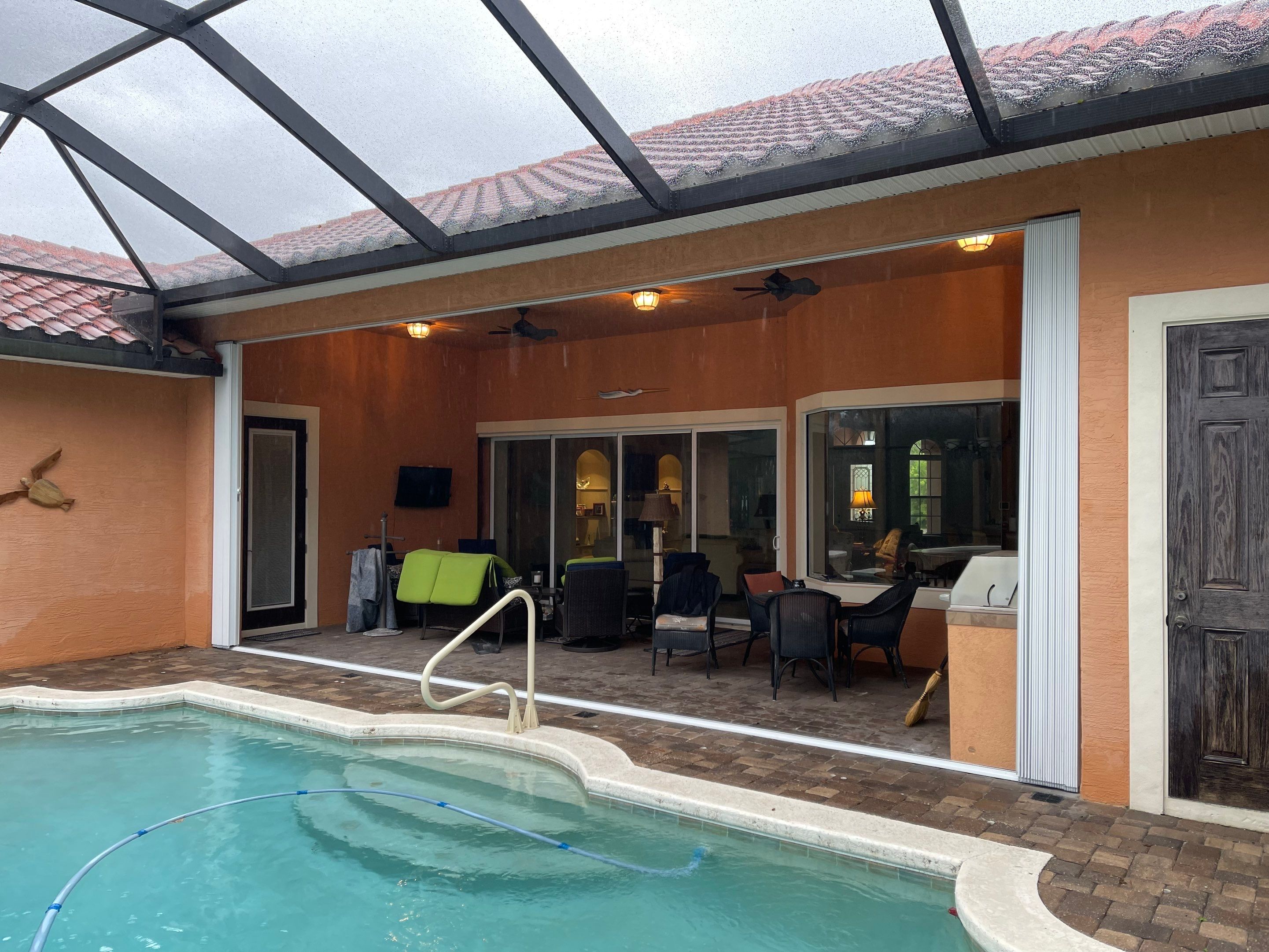 Lanai opening using accordion shutters by Smart Guard Shutters
