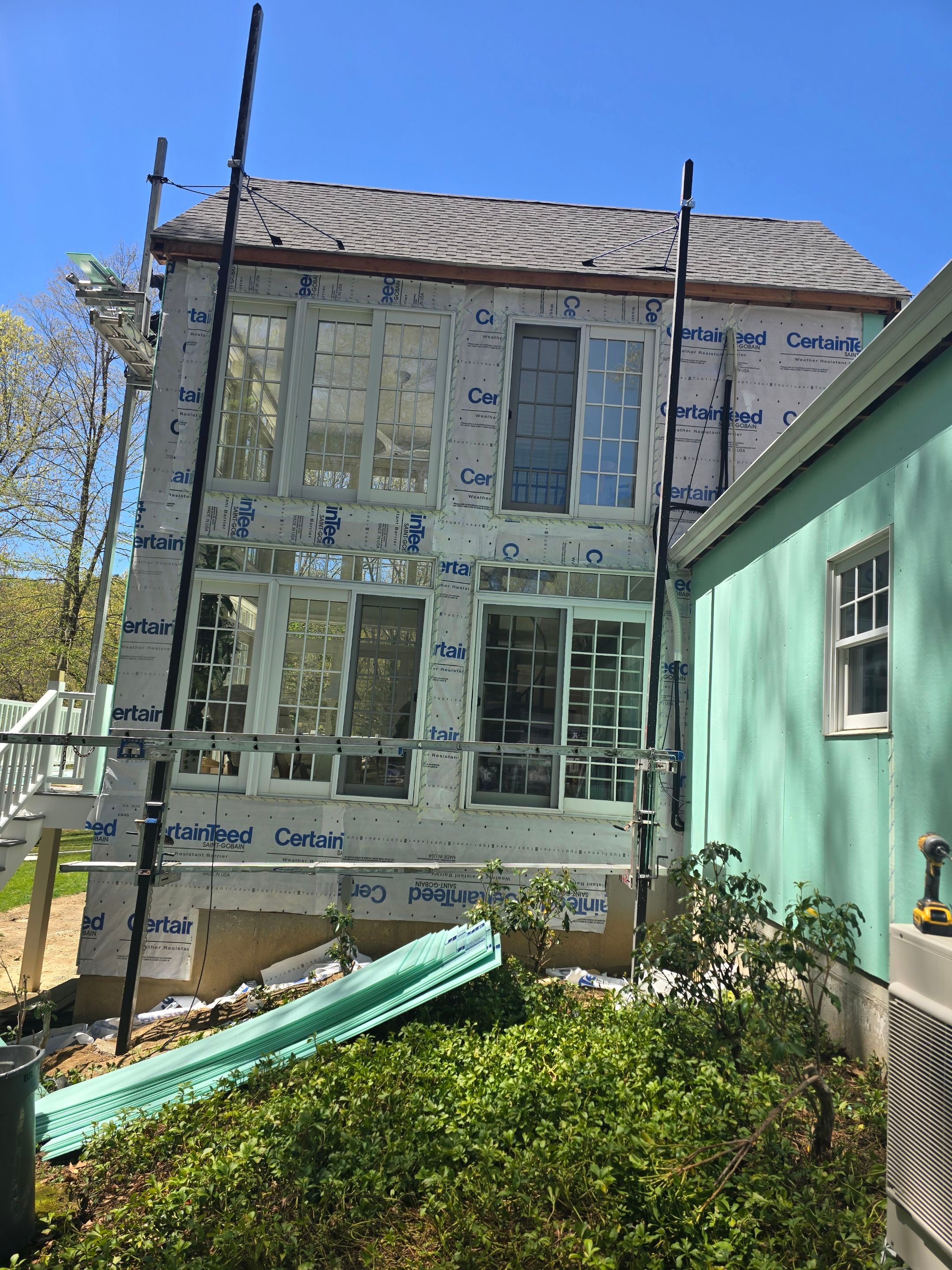 Siding refreshed with Cert. Monogram D/4 x 12'6" clapboard, Smoky Gray and Stone Facade, Coastal Gray by DiGiorgi Roofing and Siding Inc