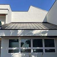 .032 Aluminum 1.5" Mechanical Seam Dark Bronze by Total Roofing System The Metal Roof Experts