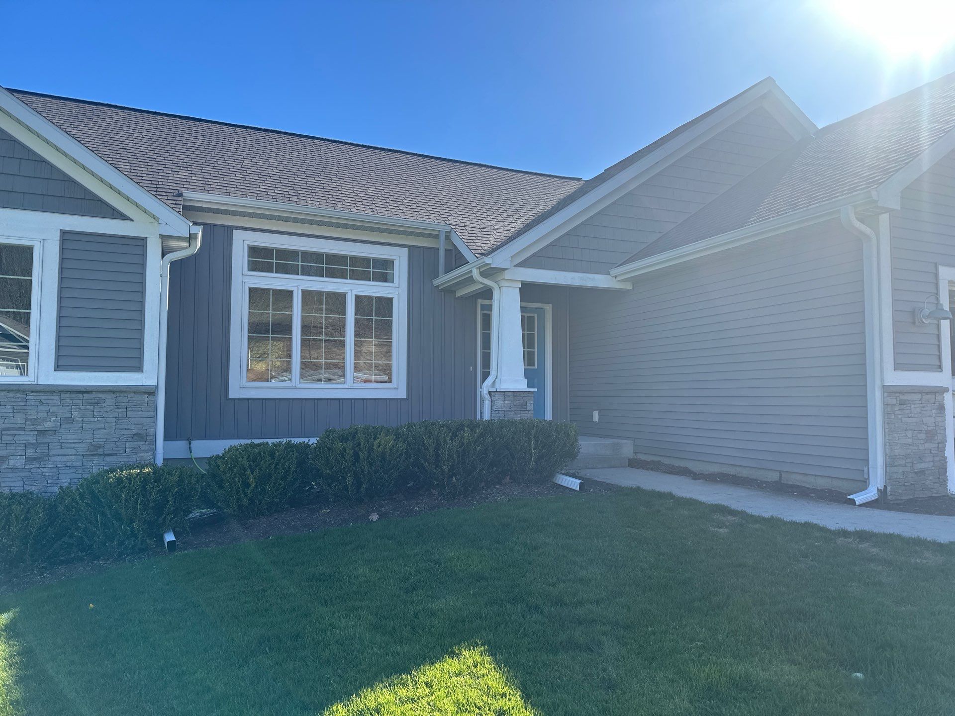 Gutter and Downspout Installation for Traverse City Residential Home by Rainbow Seamless Systems