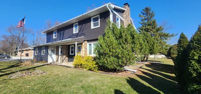 Vinyl siding replacement using CertainTeed Monogram double 5" vinyl siding 