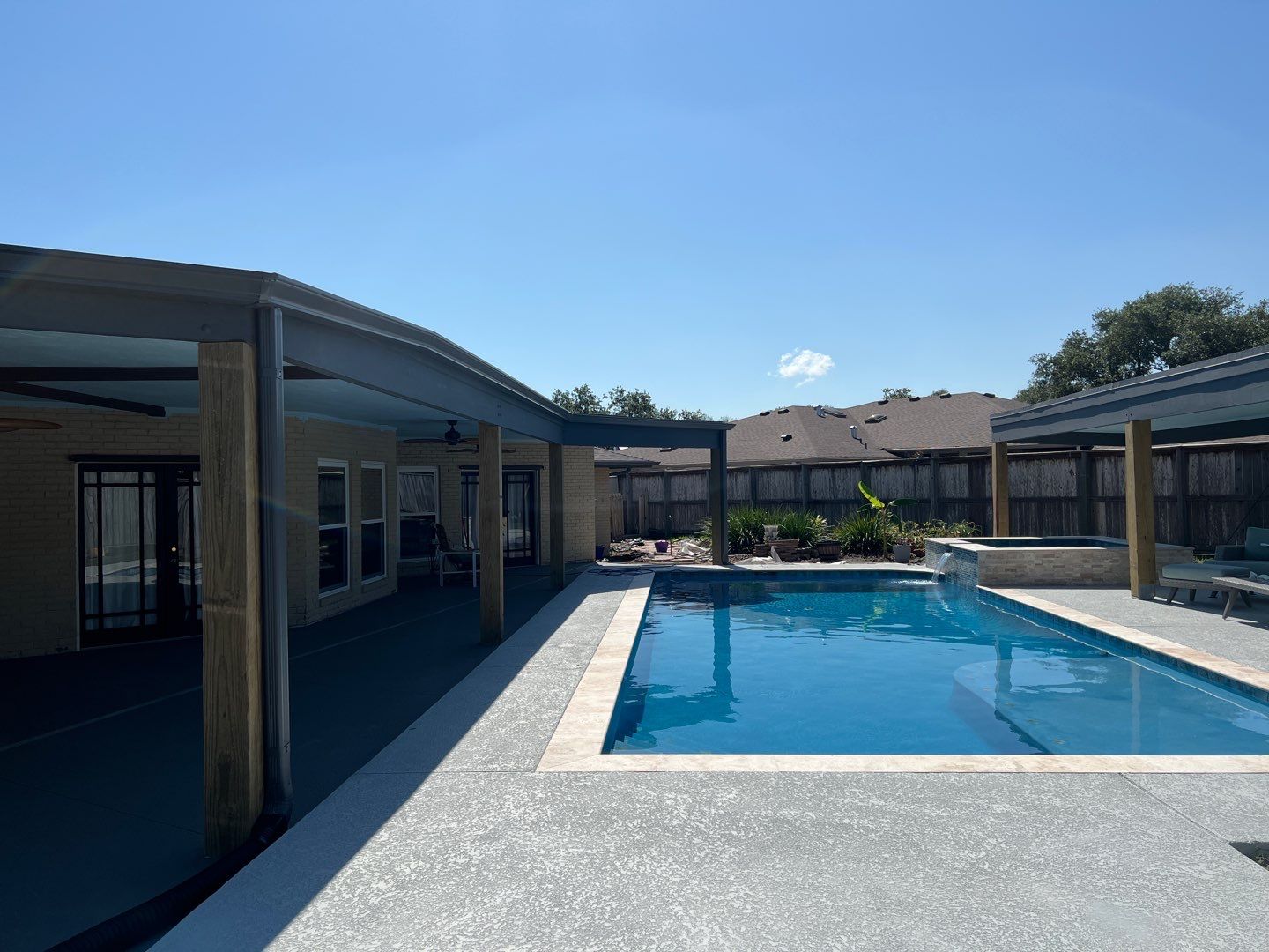 Beautiful pool side build by Bayfront Roofing and Construction