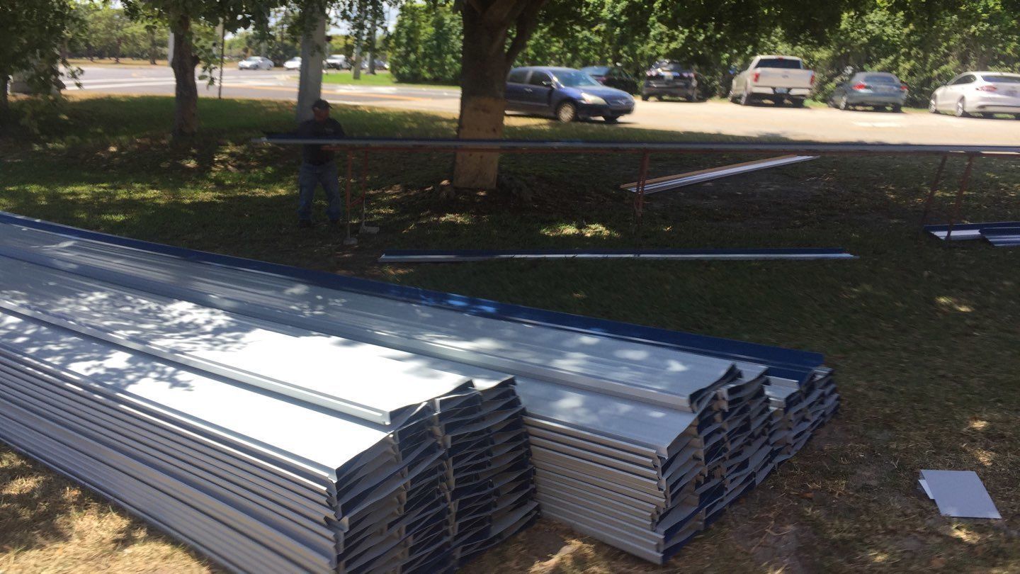 Residential Roofing Installation using 1.5'' Mechanical Seam by BLUES BROTHERS ROOFING