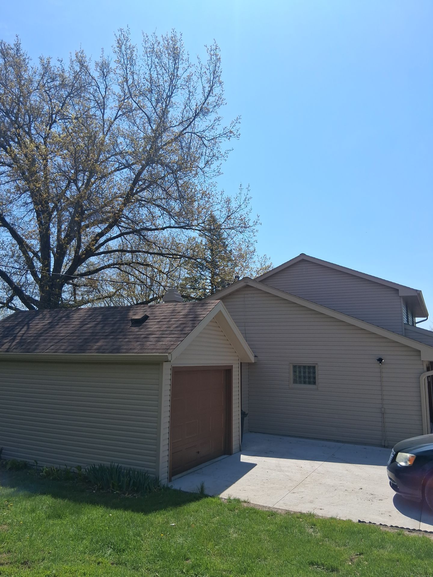 Residential Exterior Repaint Including Shop and Shed  by Midwest Paint LLC
