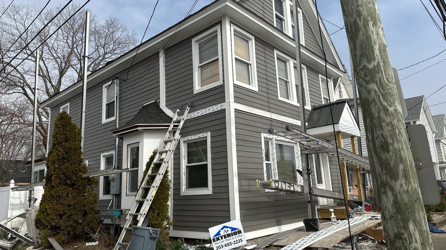 Siding Installation using Hardie Plank Aged Pewter by A Plus Exterior