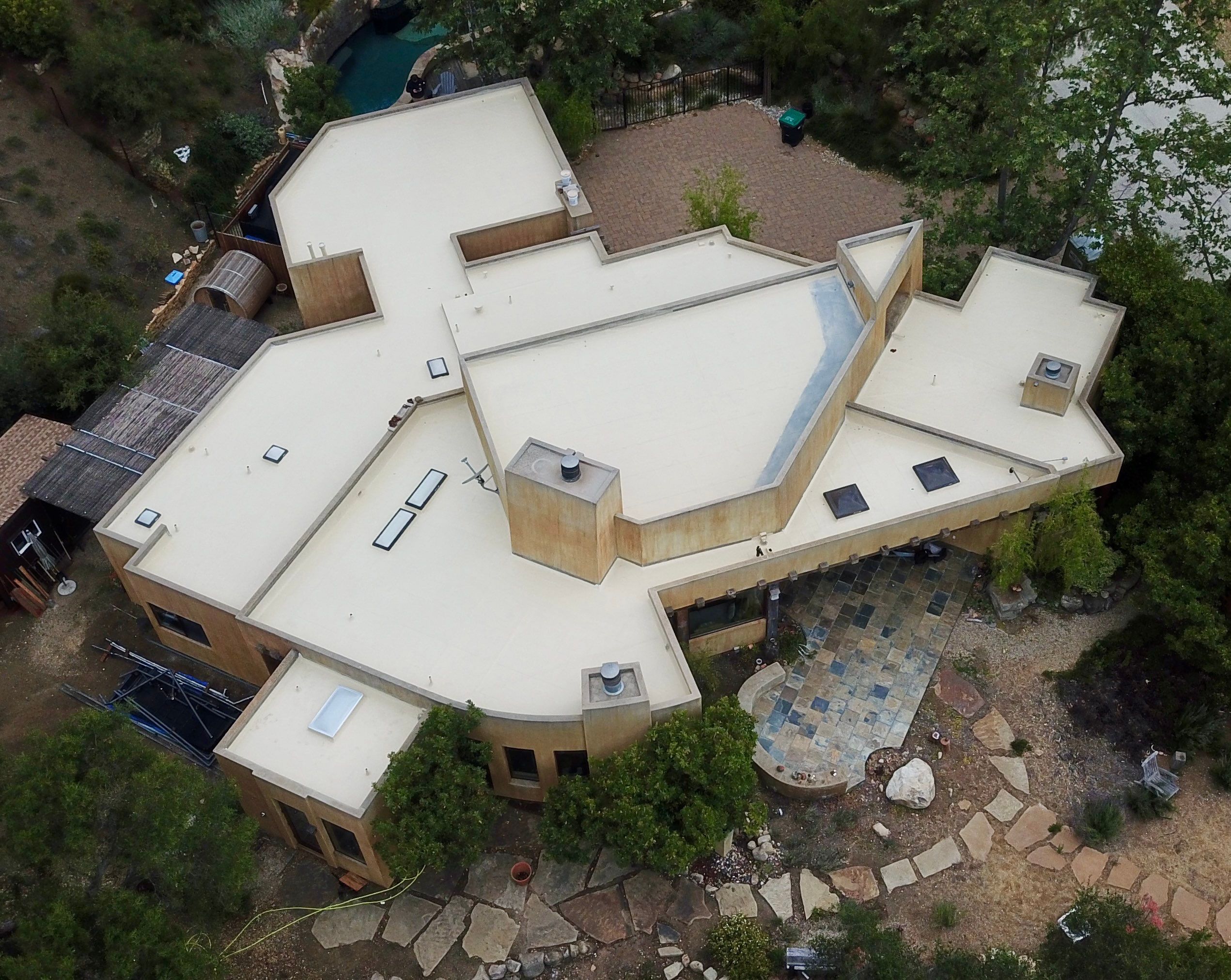 Tan Silicone Applied to a Stunning Residential Property in Calabasas by Hull Brothers Roofing
