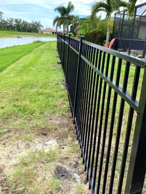Aluminum Fence Installation using Black 3 Rail Aluminum Fence