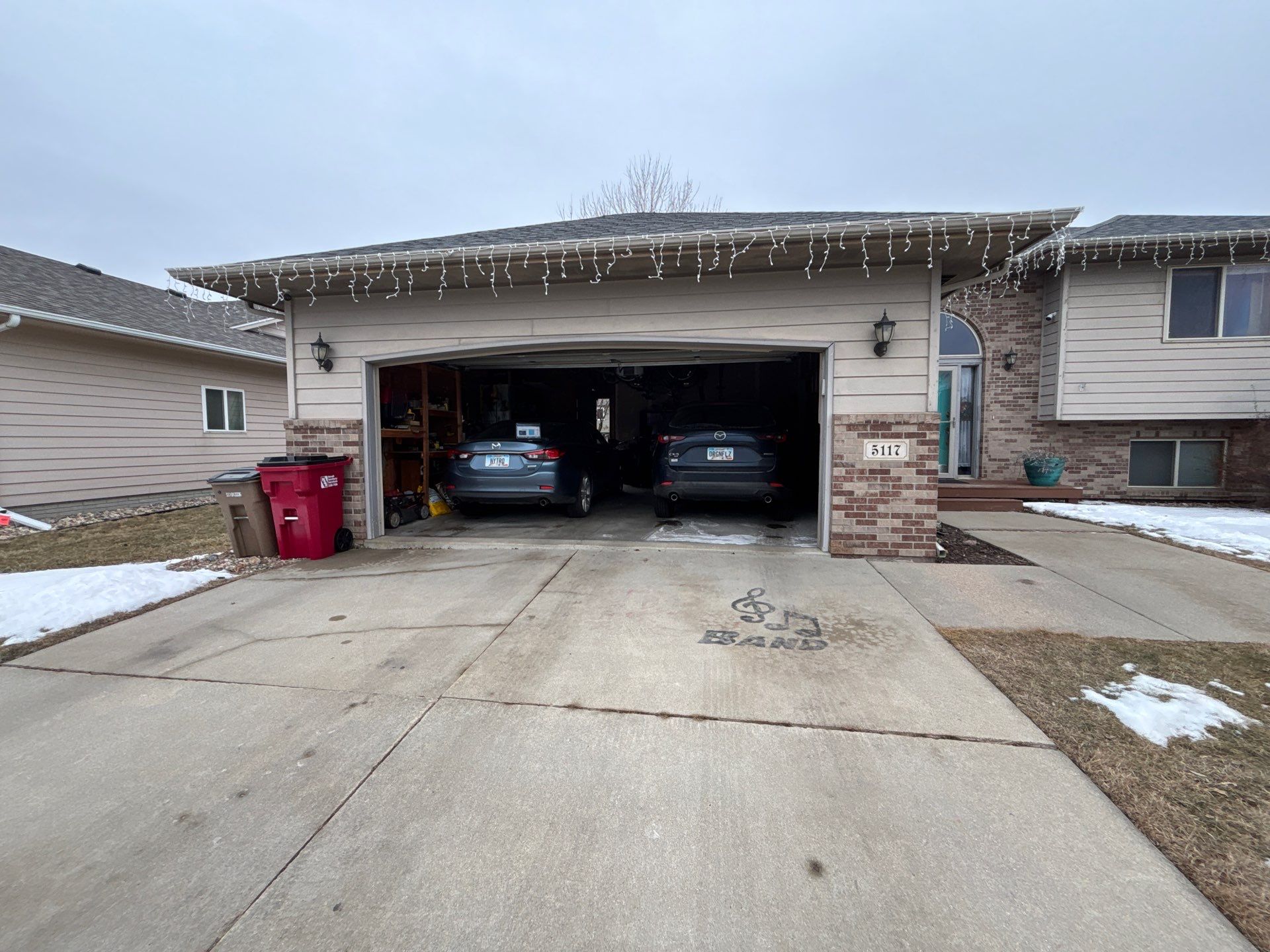 Exterior Painting and Wood Trim Replacement in Sioux Falls by Select Painting, Coatings & Garage Cabinets
