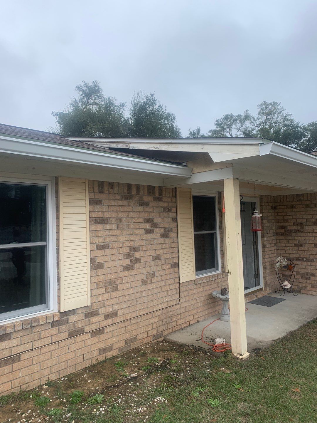 White Seamless Gutter Installation in Milton FL by Gutter Professors