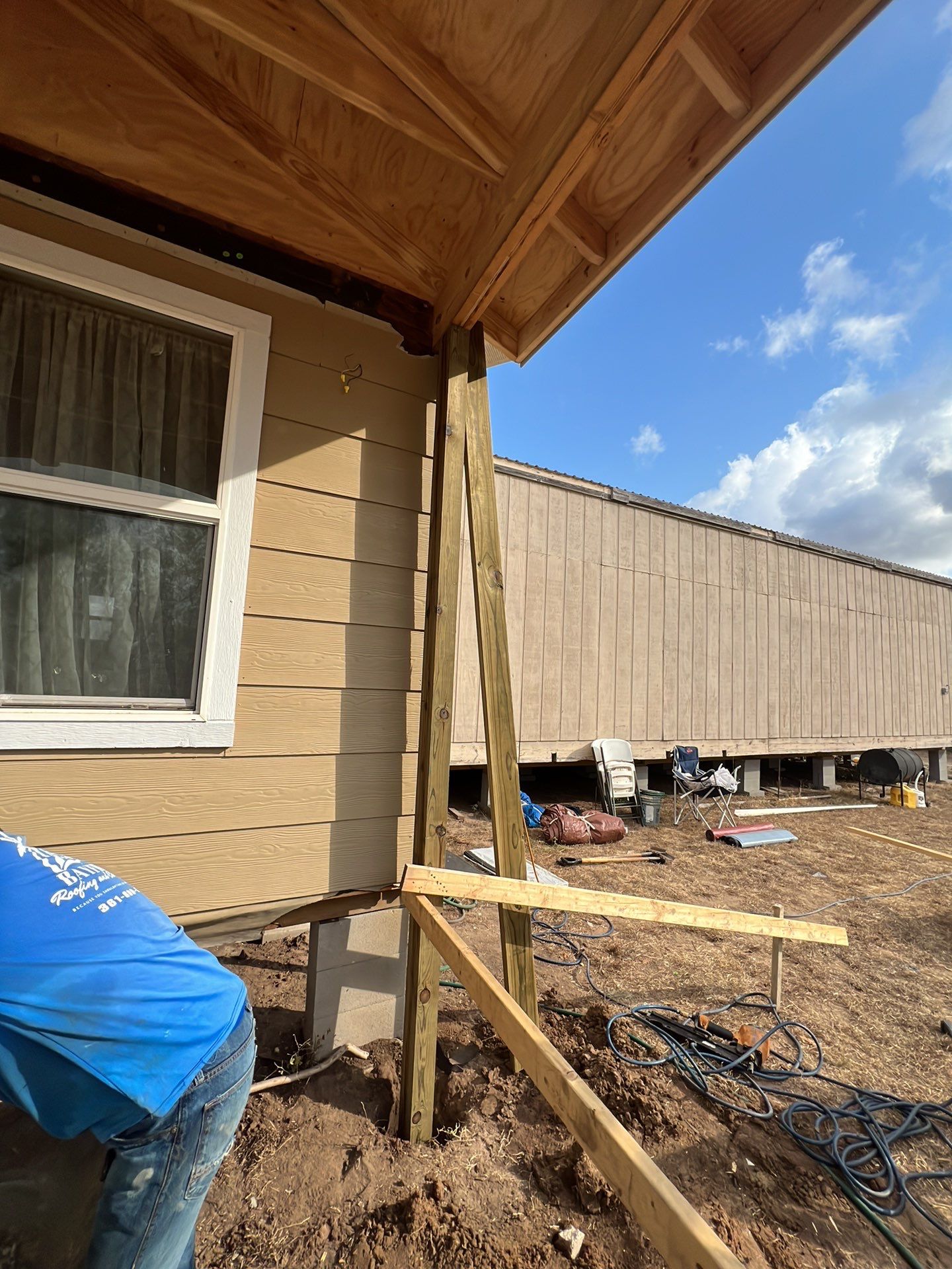 Front Porch Sitt'n by Bayfront Roofing and Construction