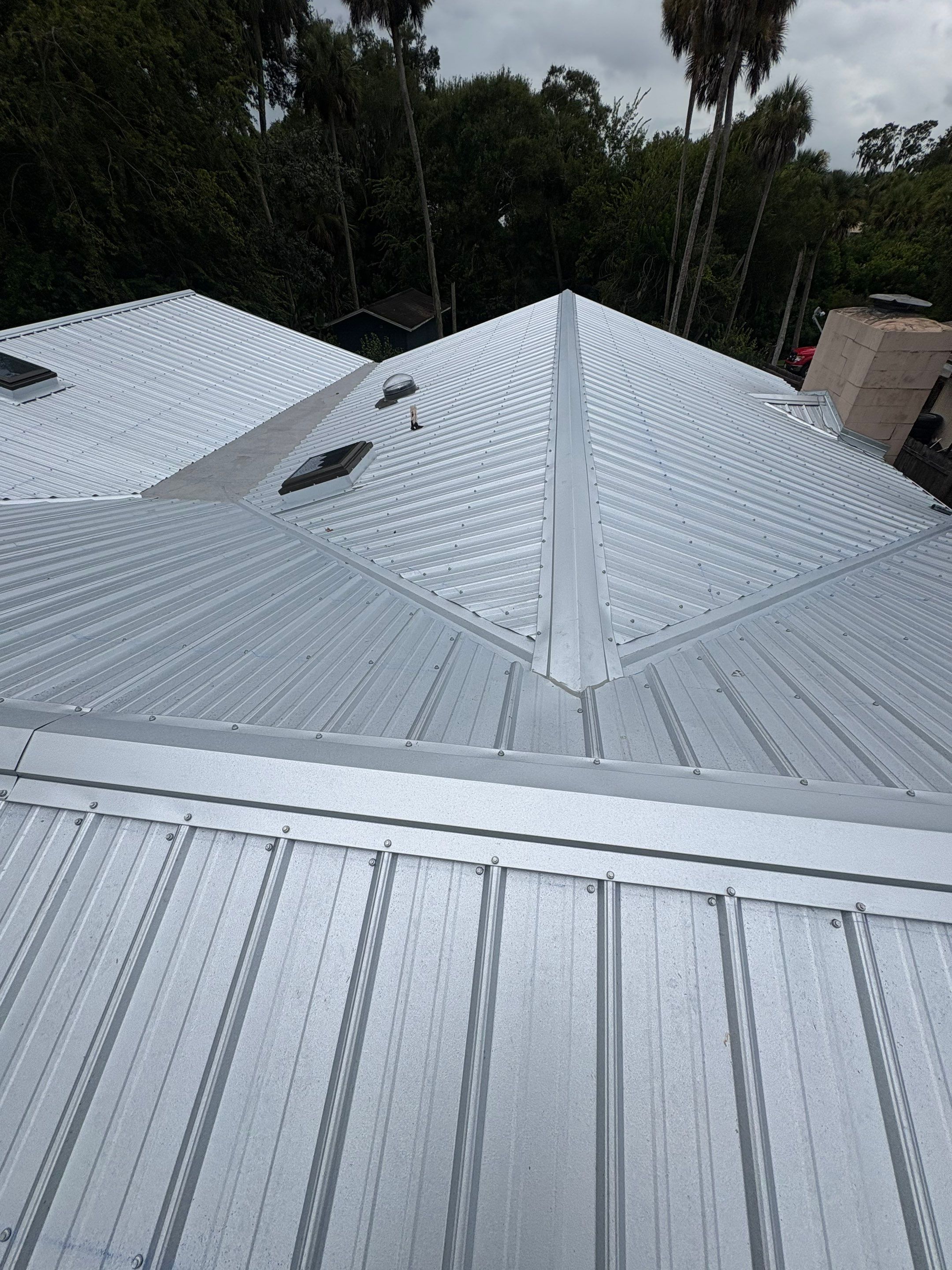 Residential Metal Roofing Installation with Ultra Rib Panels in New Smyrna Beach by Pinnacle Roofing Group