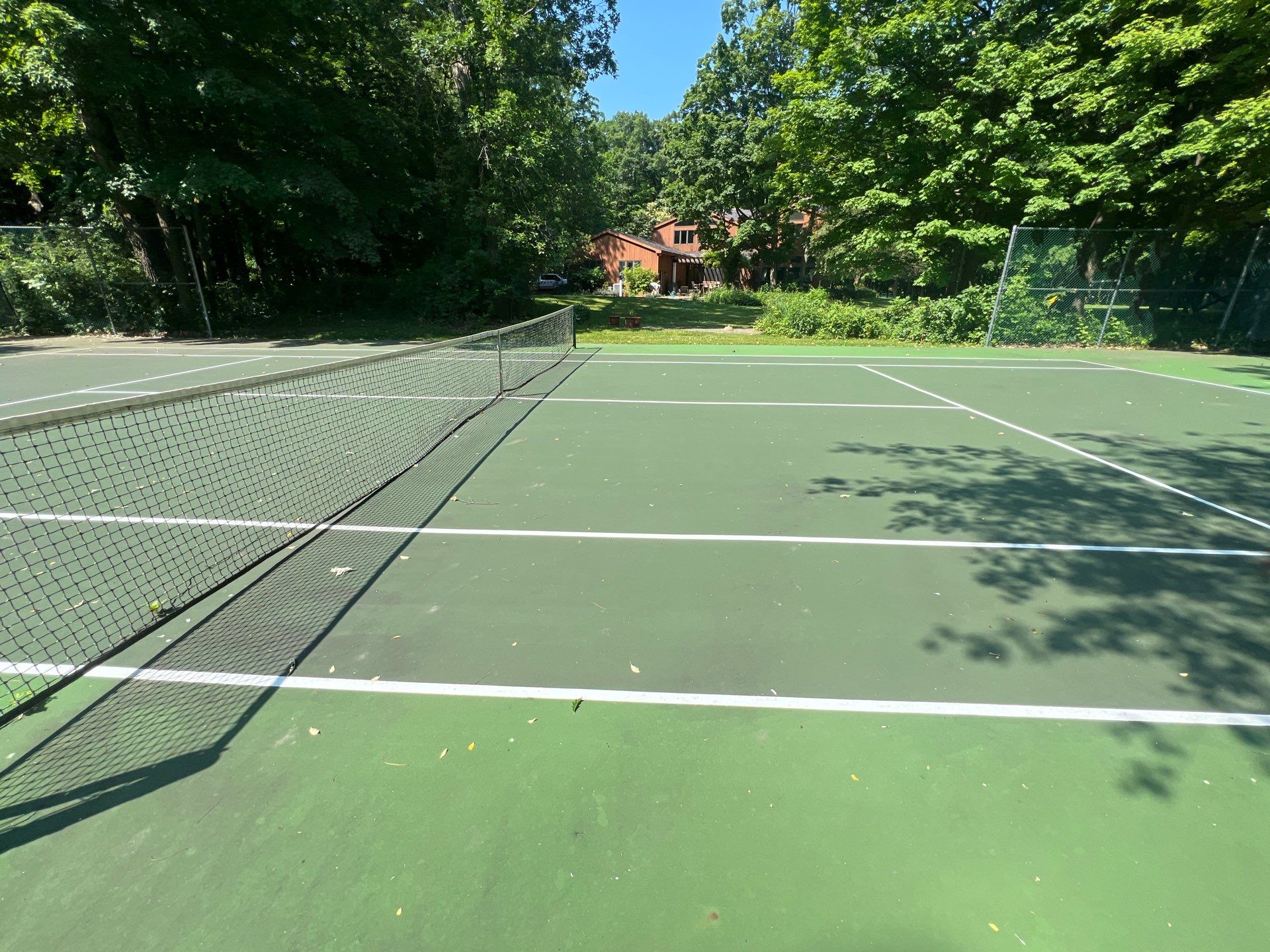 Deck, Patio, and Tennis Court Cleaning by Northern Power Washing LLC.
