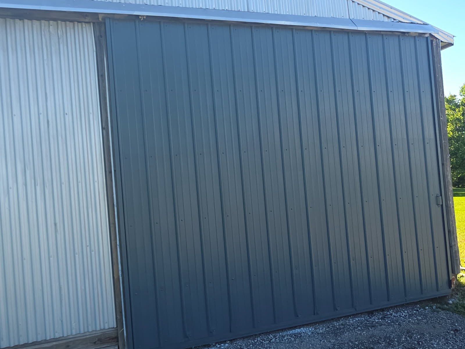 Exterior Painting and Trim Restoration for Mears Metal Buildings by Gordon Painting
