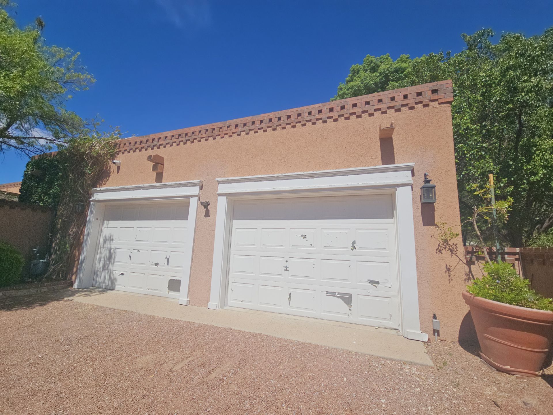 Exterior Painting, Repair, and Garage Floor Coating by Regal Renovate