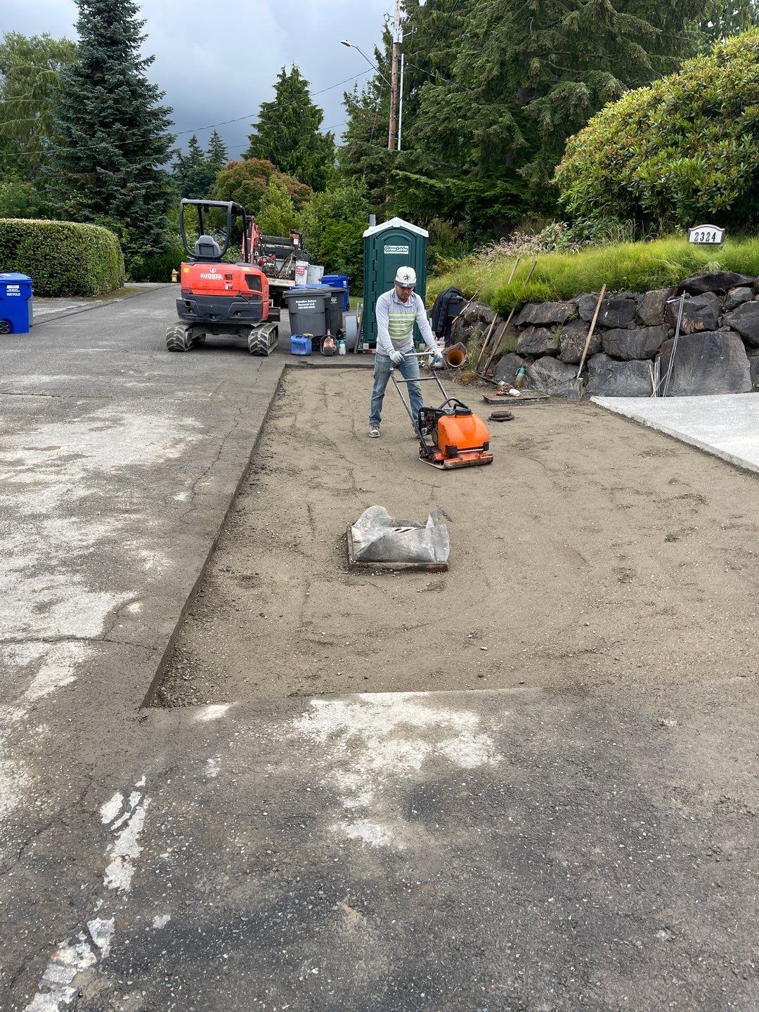 Concrete Driveway Makeover w/ Asphalt Patch | Everett  by Jireh Asphalt & Concrete Inc 