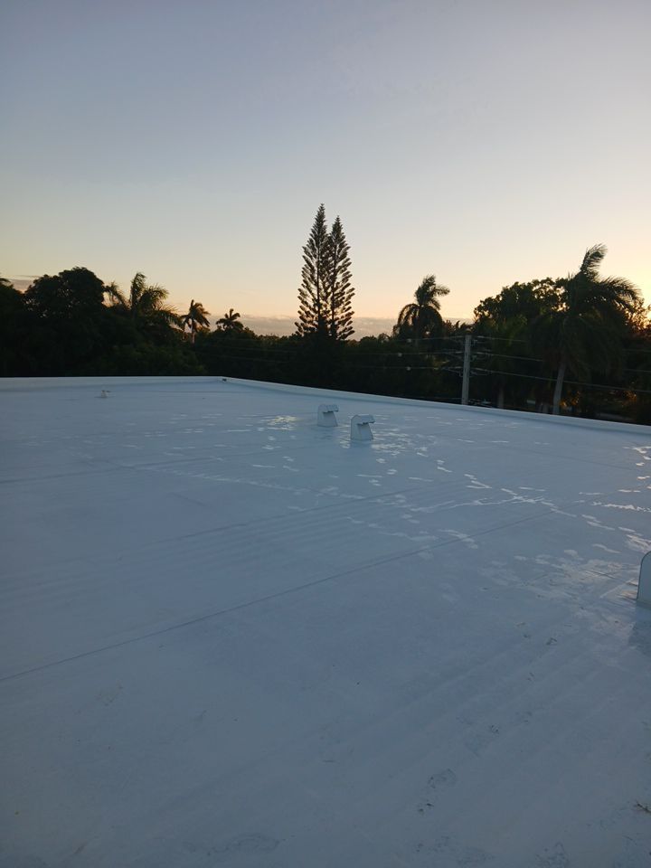 Flat Roof White Membrane and Insulation Installation in Miami Beach by AJF ROOFING INC