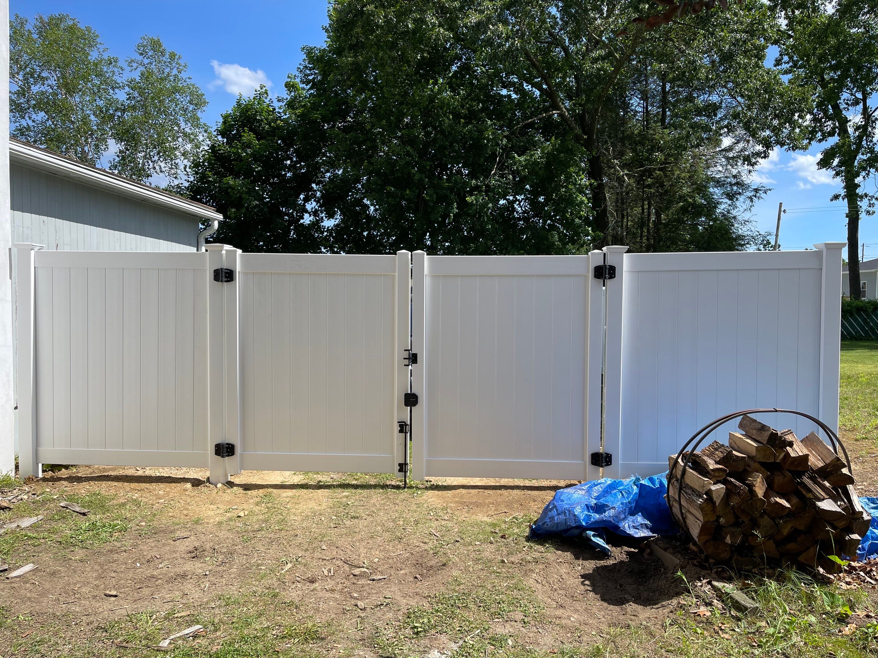 Replacement Vinyl Privacy fence with 3 matching gates in White. by DiGiorgi Roofing and Siding Inc