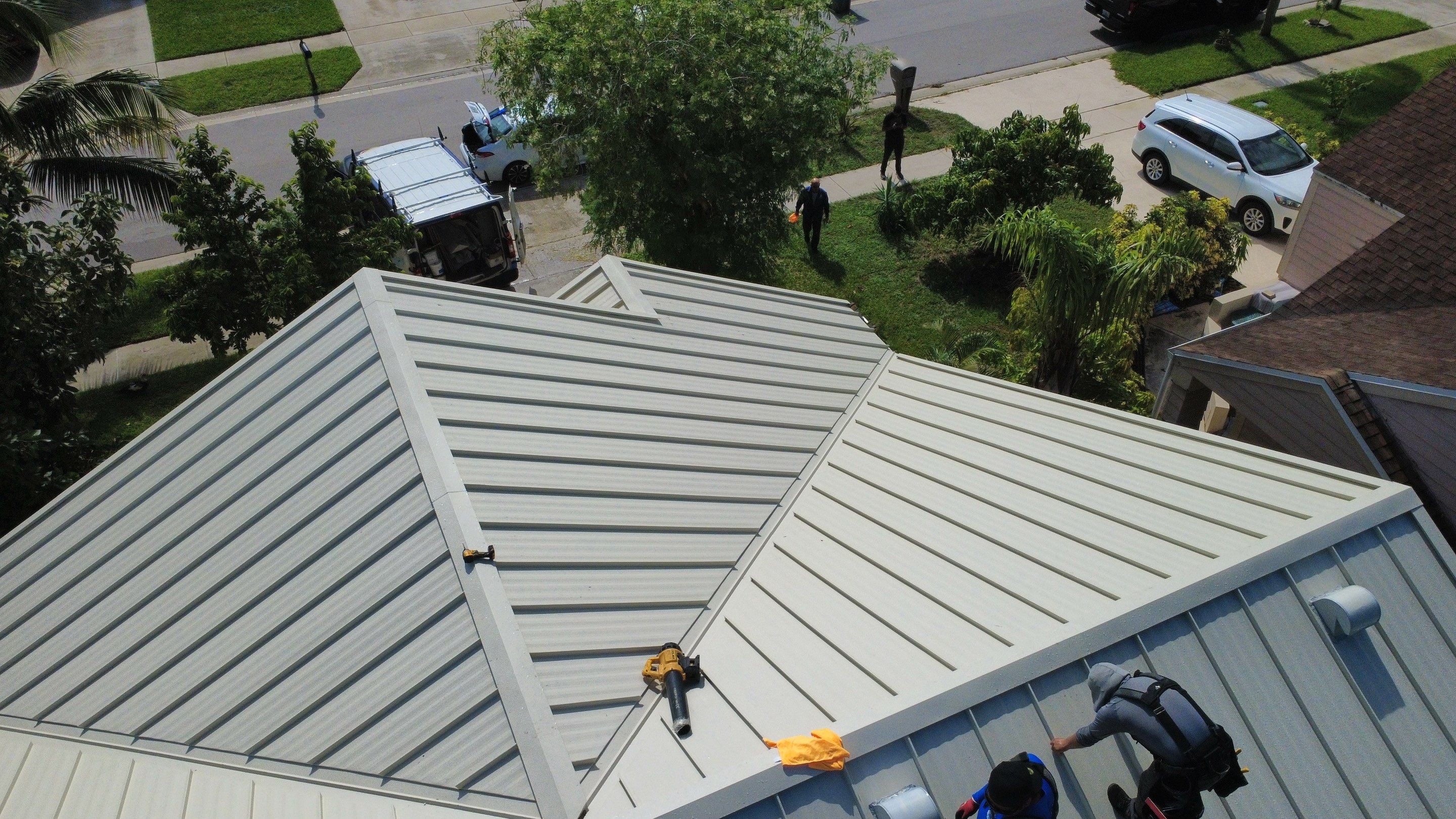Residential Roofing Installation using 1.5'' Mechanical Seam by BLUES BROTHERS ROOFING