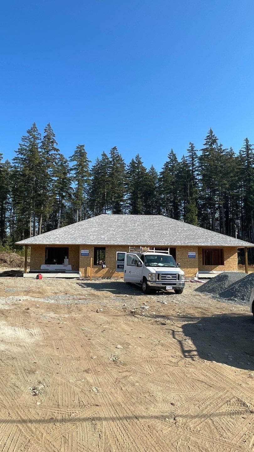 Residential Roofing Installation using OC Oakridge shingles by Top Notch Roofing Inc