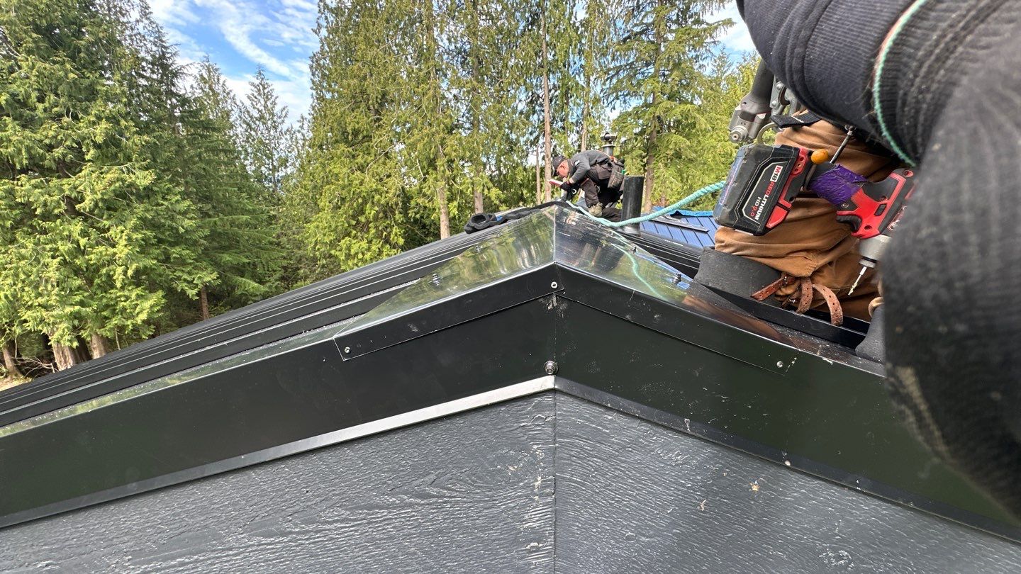 Residential ReRoofing Installation using 12" Prolok metal by Top Notch Roofing Inc