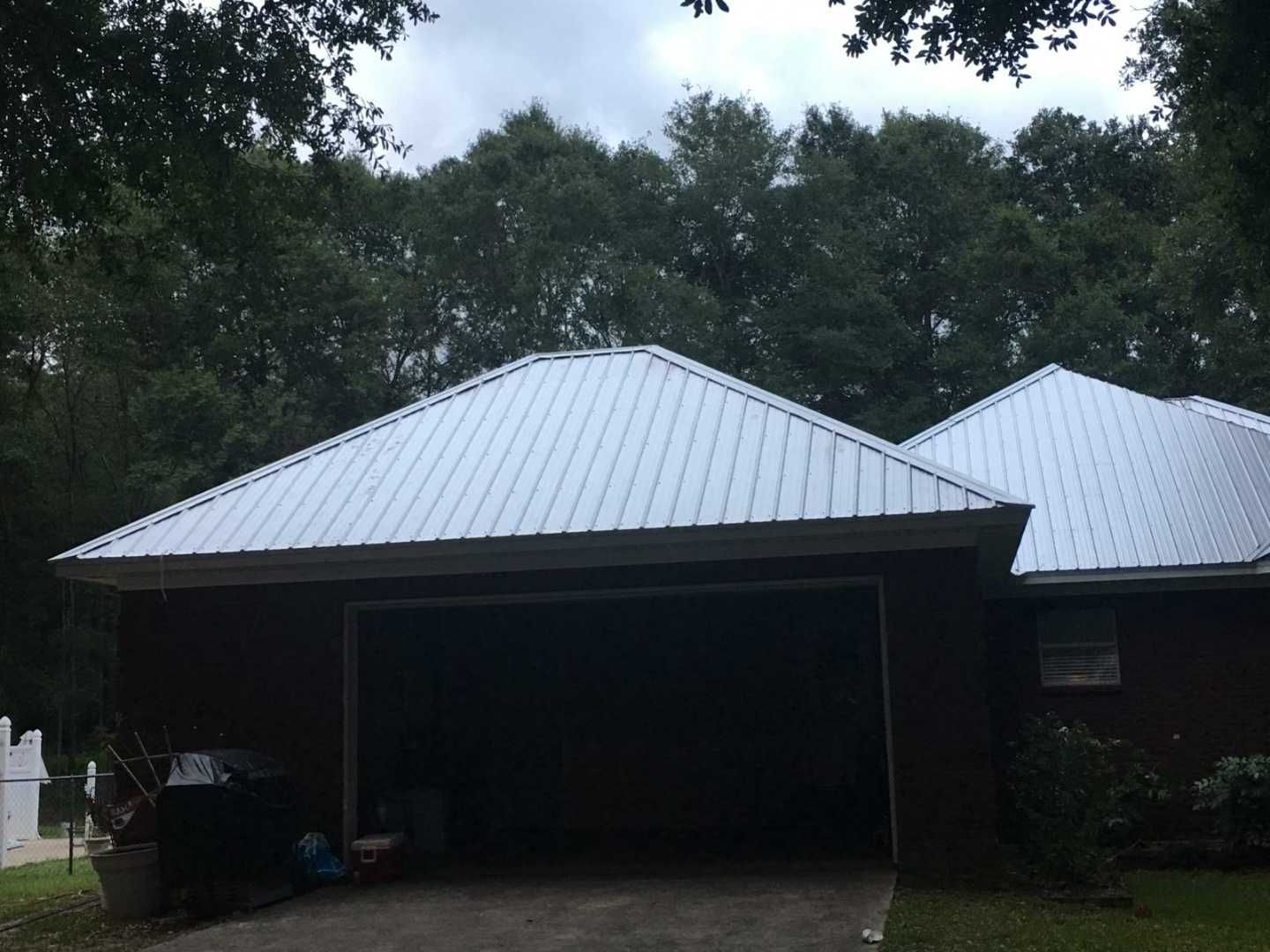 Residential Roofing Installation using Metal roofing by American Roofing & Construction LLC