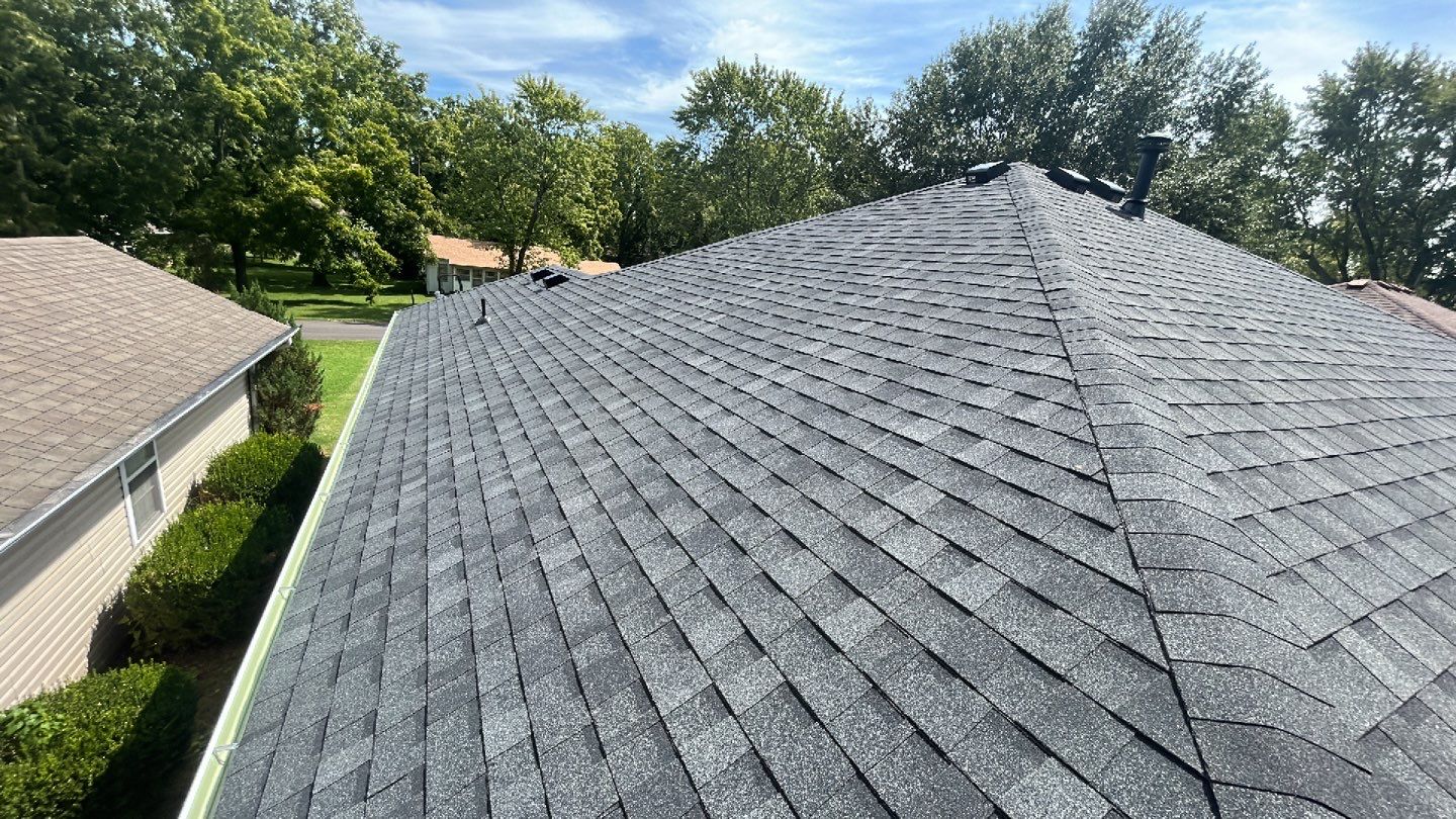 Residential Roof + Gutters & Downspouts Install  by Titan Commercial & Residential Roofing 