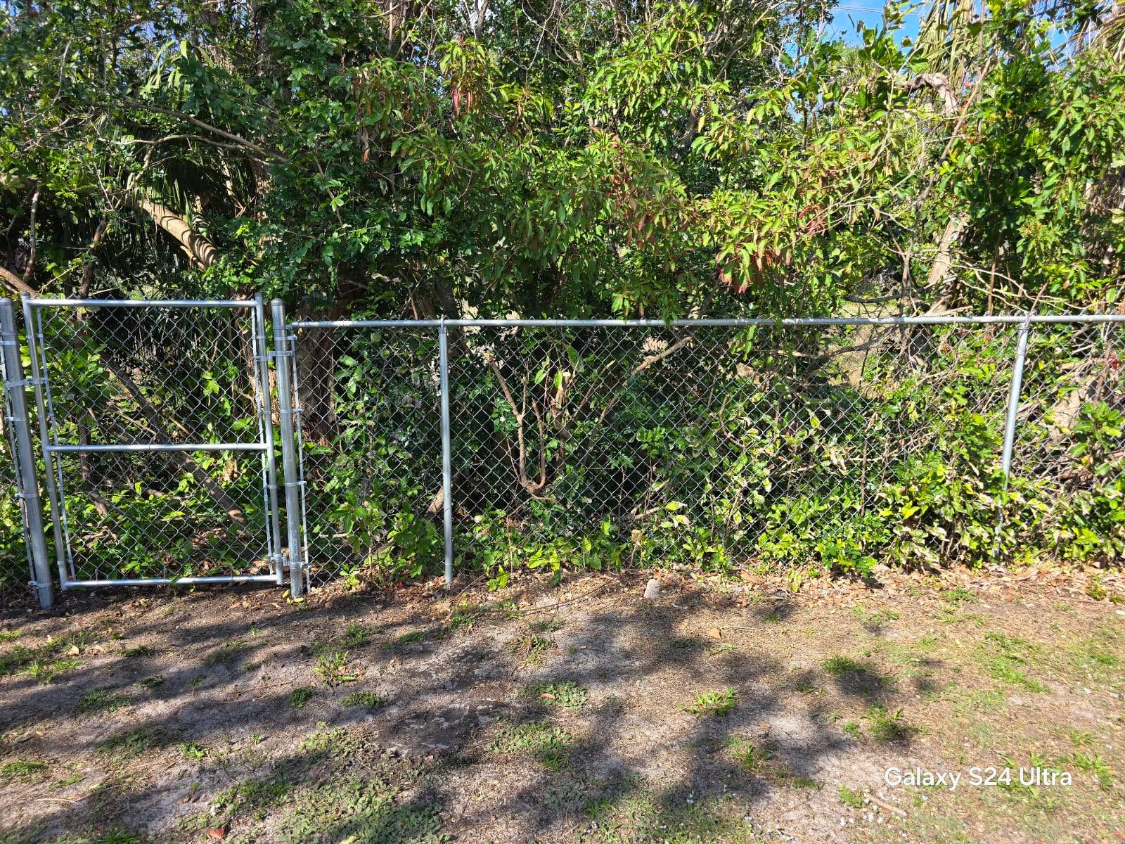Vinyl and Chain Link Combo in Venice by True Fence LLC
