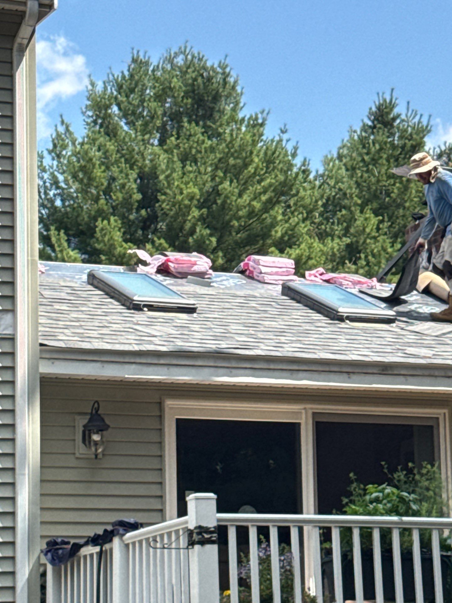 Complete Roof Replacement with Chimney Flashing, Gutter Guard System, and Vinyl Siding Repairs by Mighty Dog Roofing of Greater Middlesex County